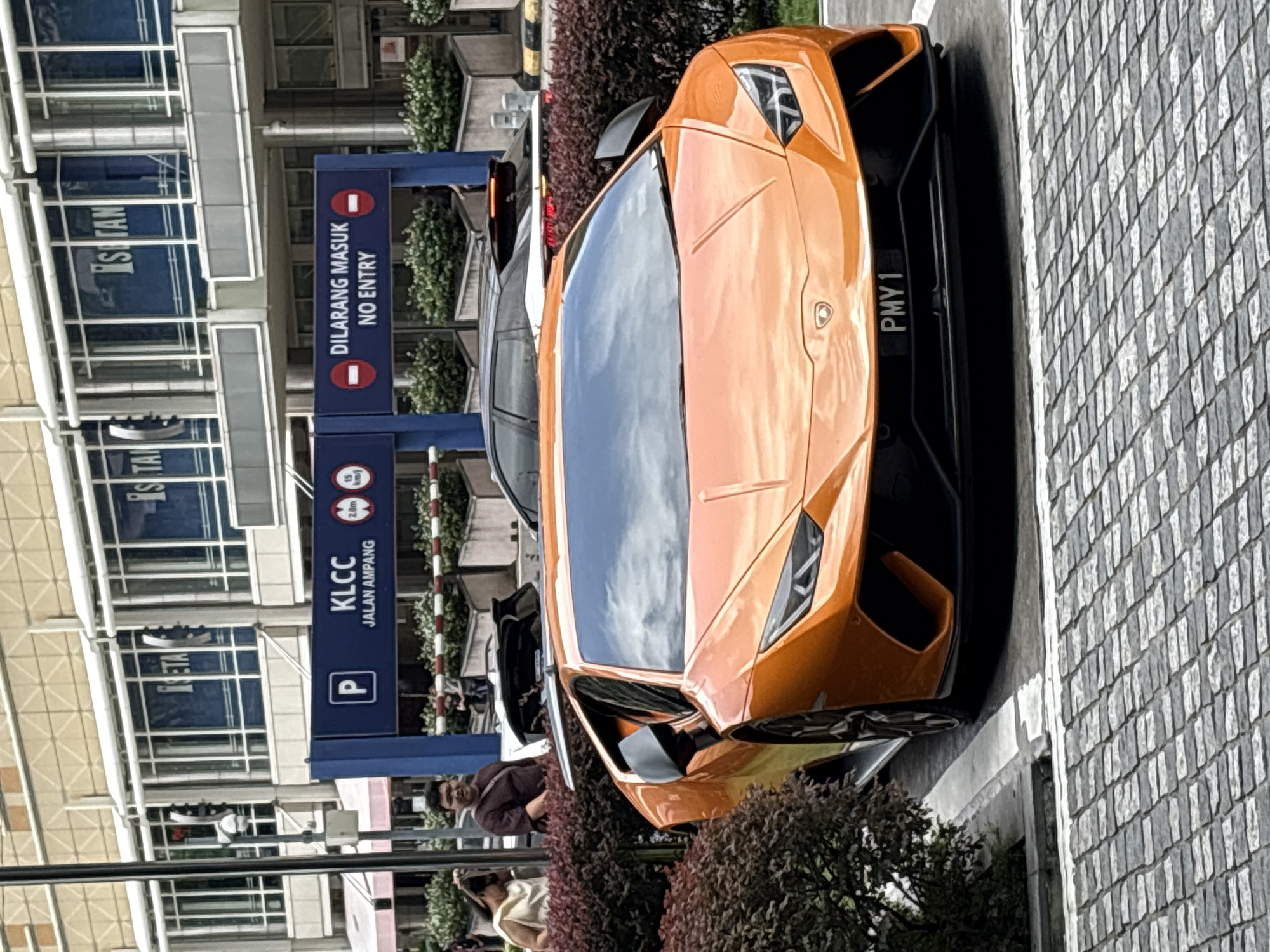 Orange Lamborghini spotted at KLCC parking in Kuala Lumpur