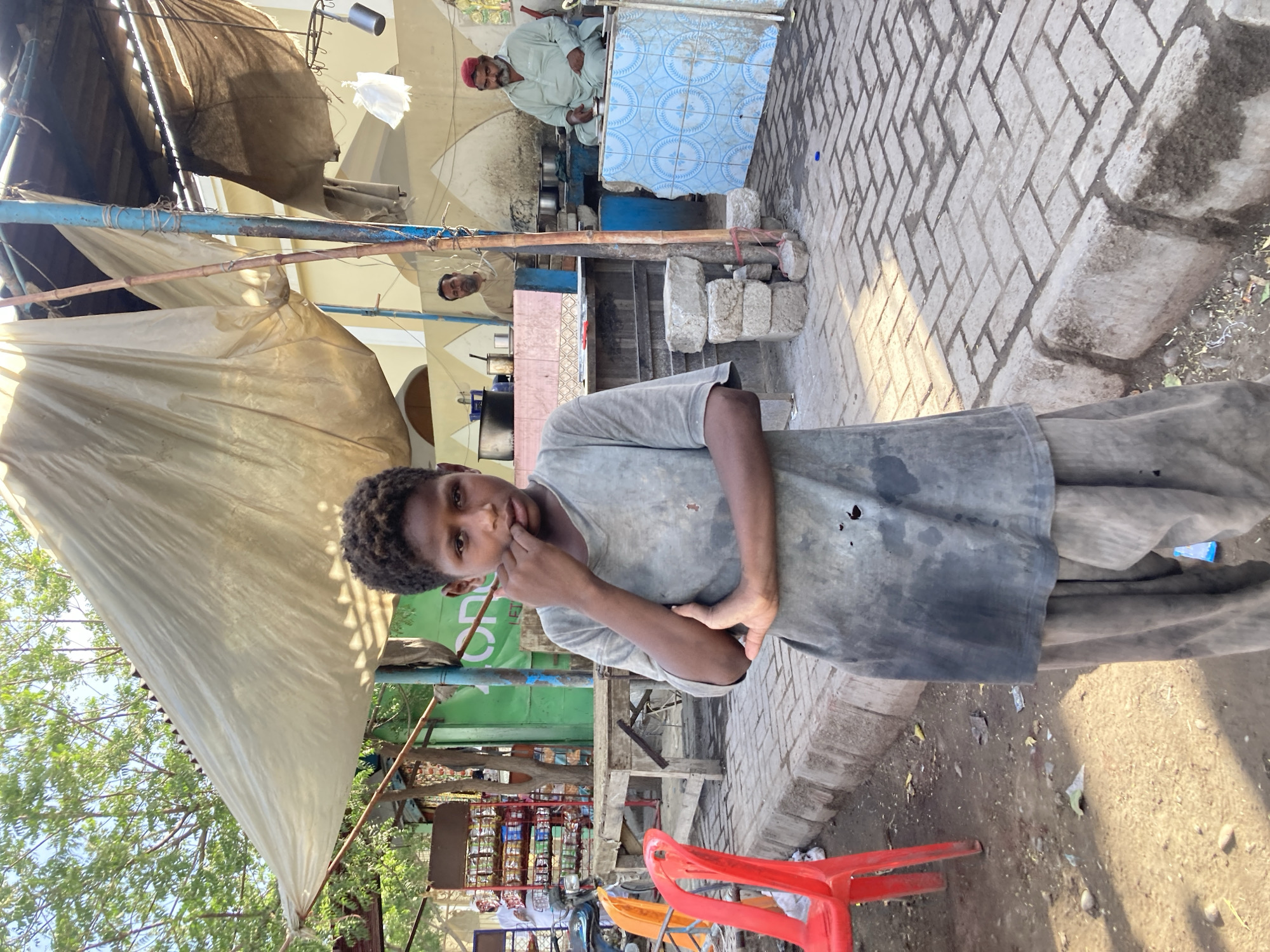 Young boy photographed on street in Uthal, Pakistan