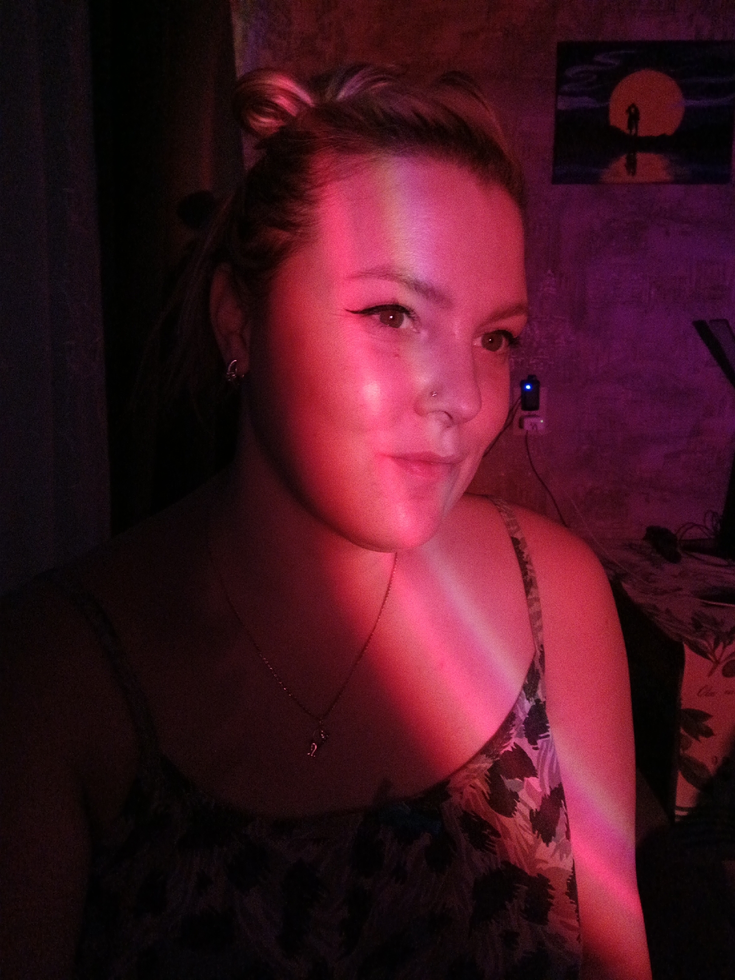 Portrait session with dramatic lighting captured in Марковский, Russia