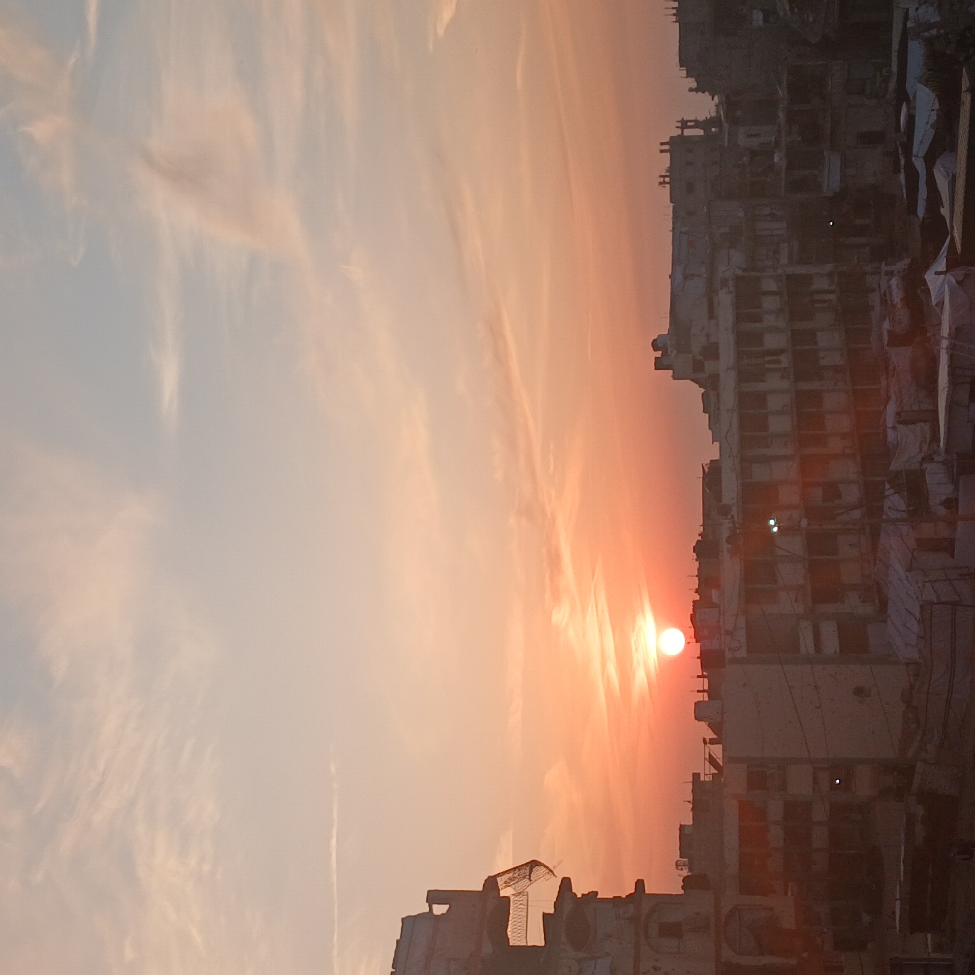 Sunset documented over Gaza refugee camps and damaged buildings