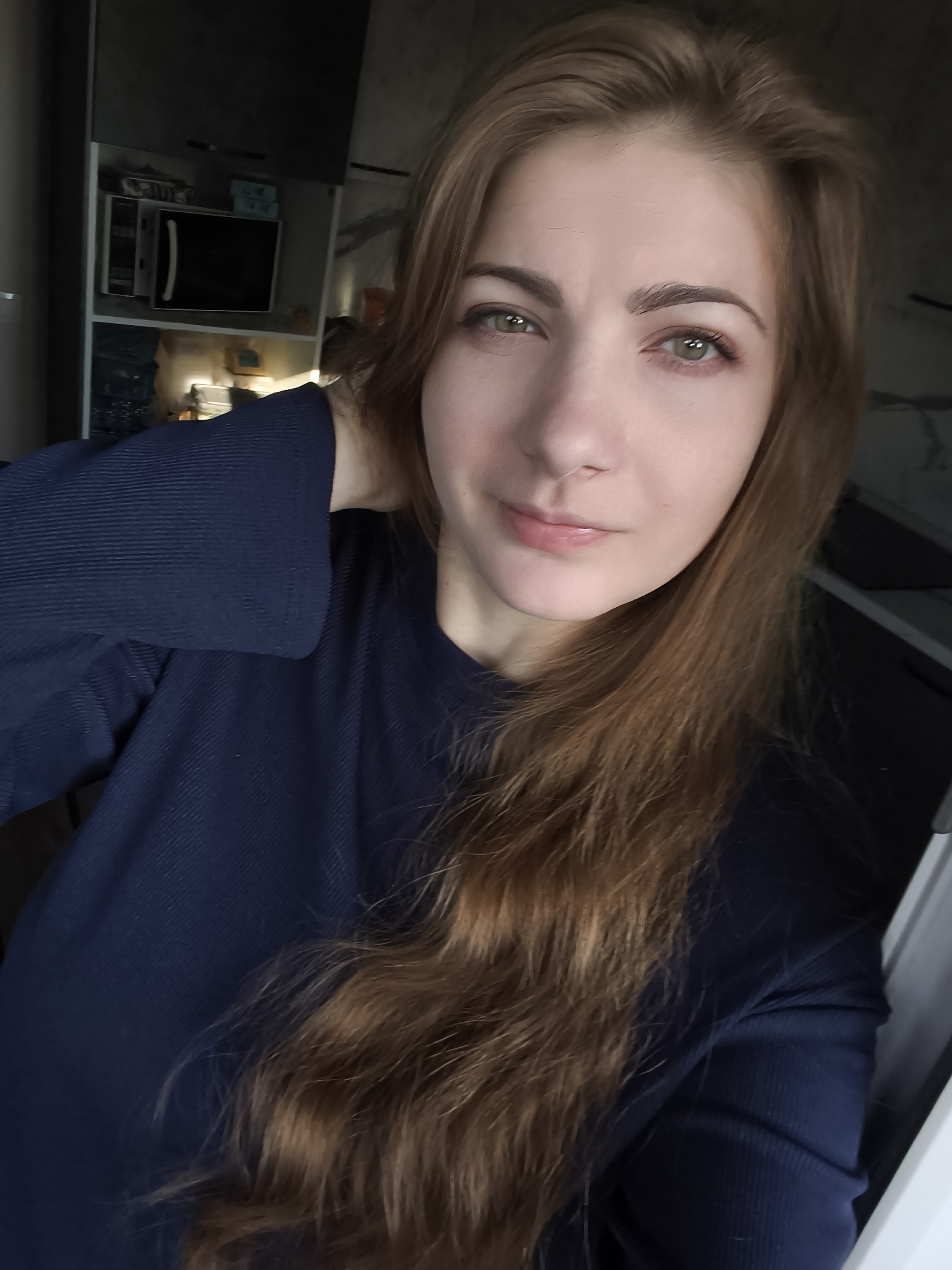Indoor selfie session, multiple angles, same outfit and setting.