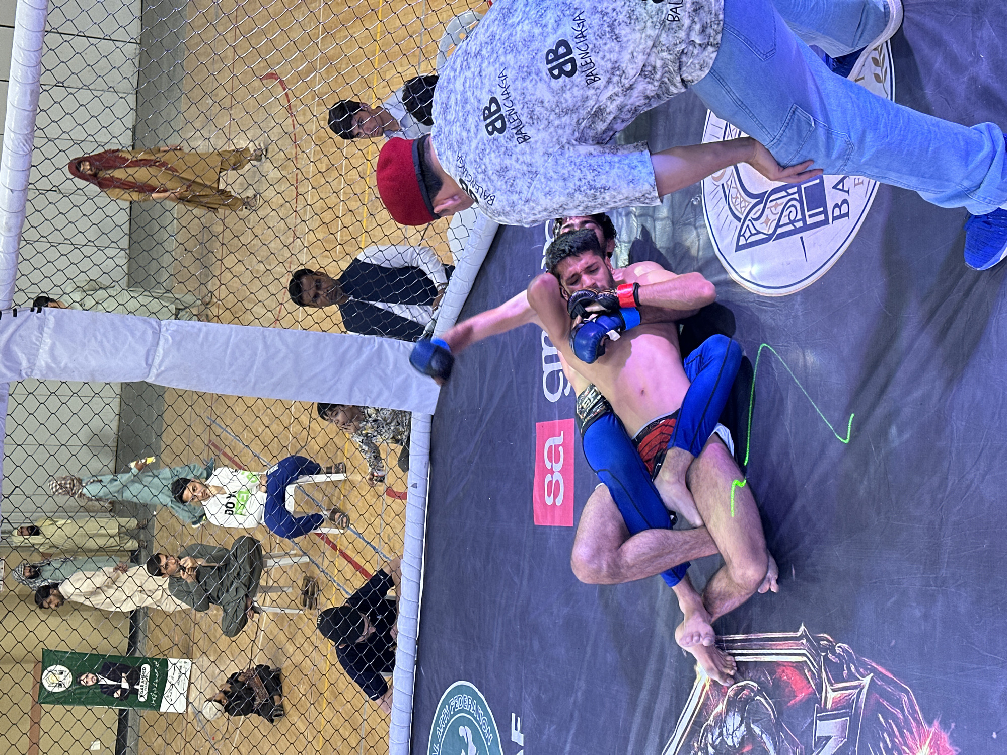 MMA match observed in Quetta with designer-clad referee