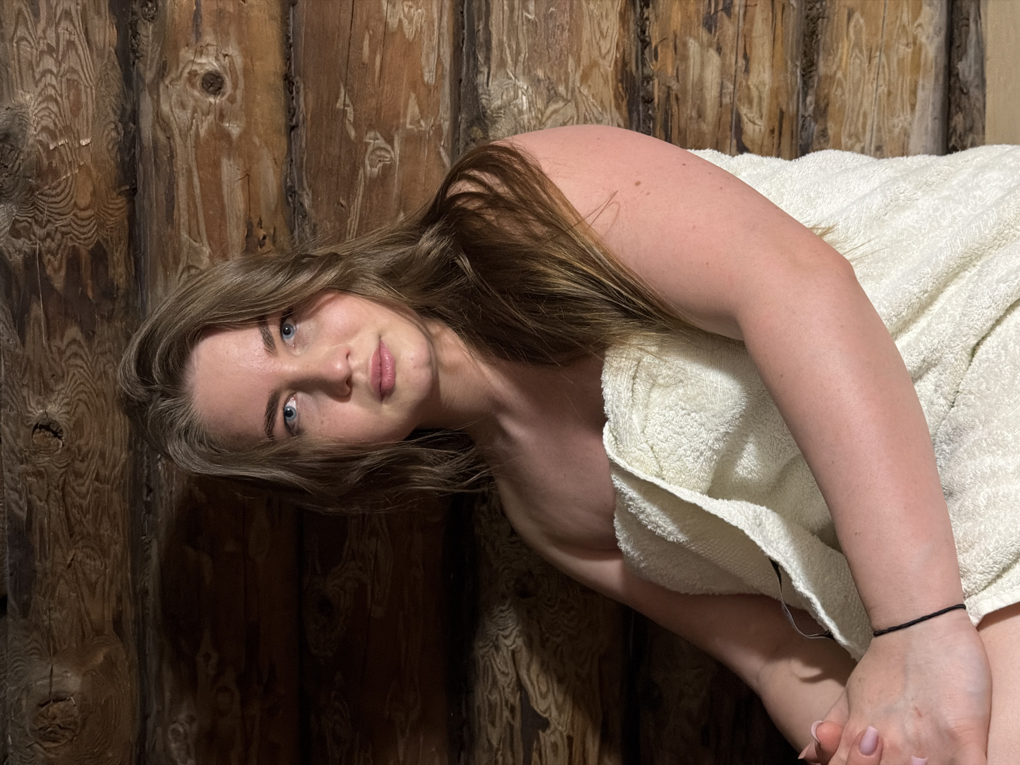 Woman photographed multiple times in rural Russian setting