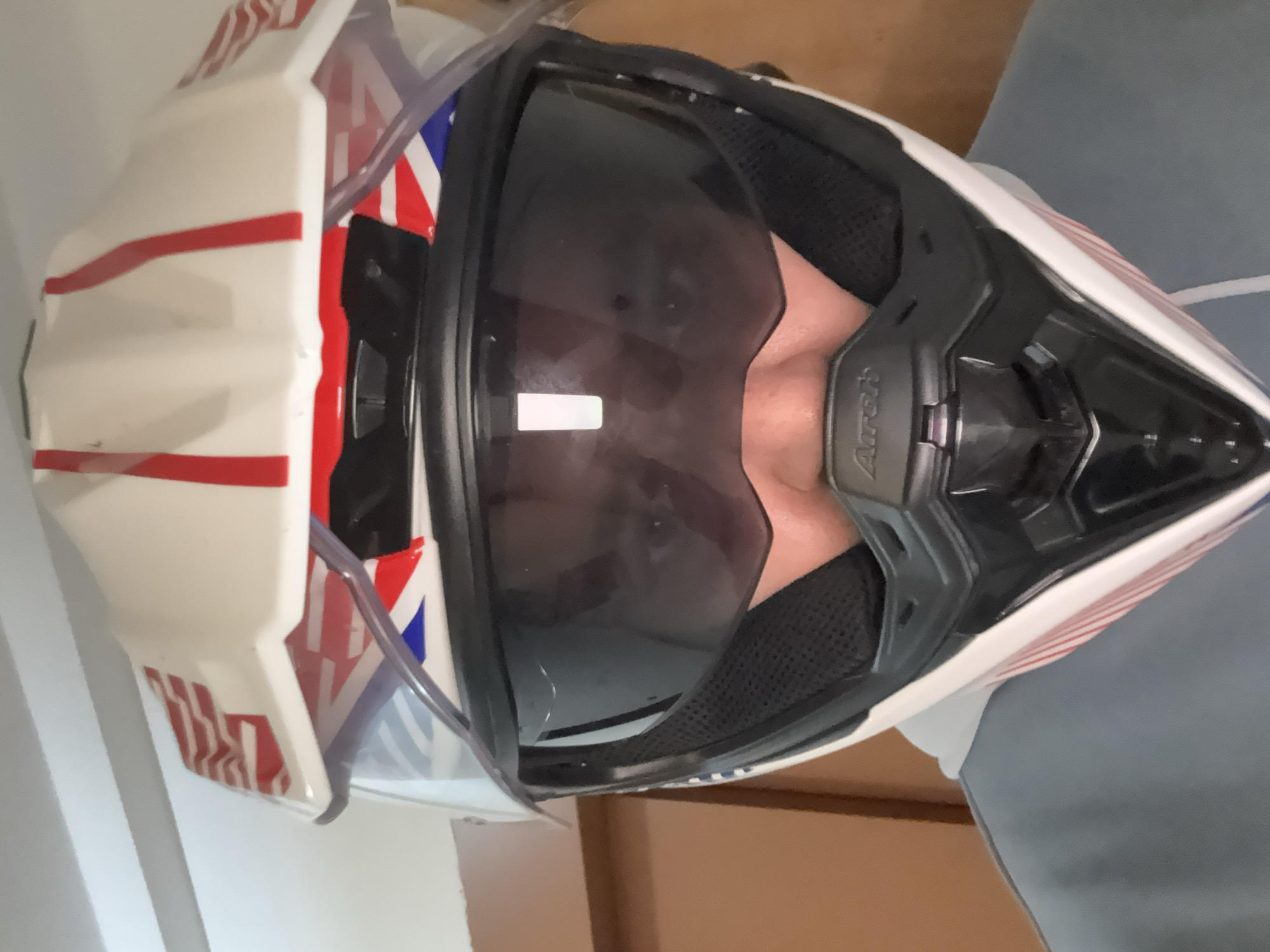 Motorcyclist spotted wearing white-red helmet in Tangier