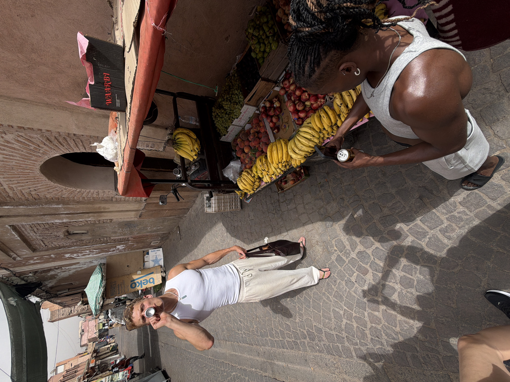 Taking a drink amid the bustle of a Marrakesh marketplace