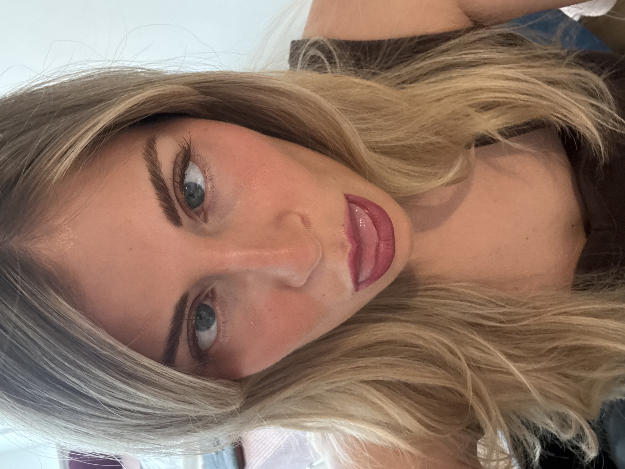 Woman takes selfies in Paris afternoon