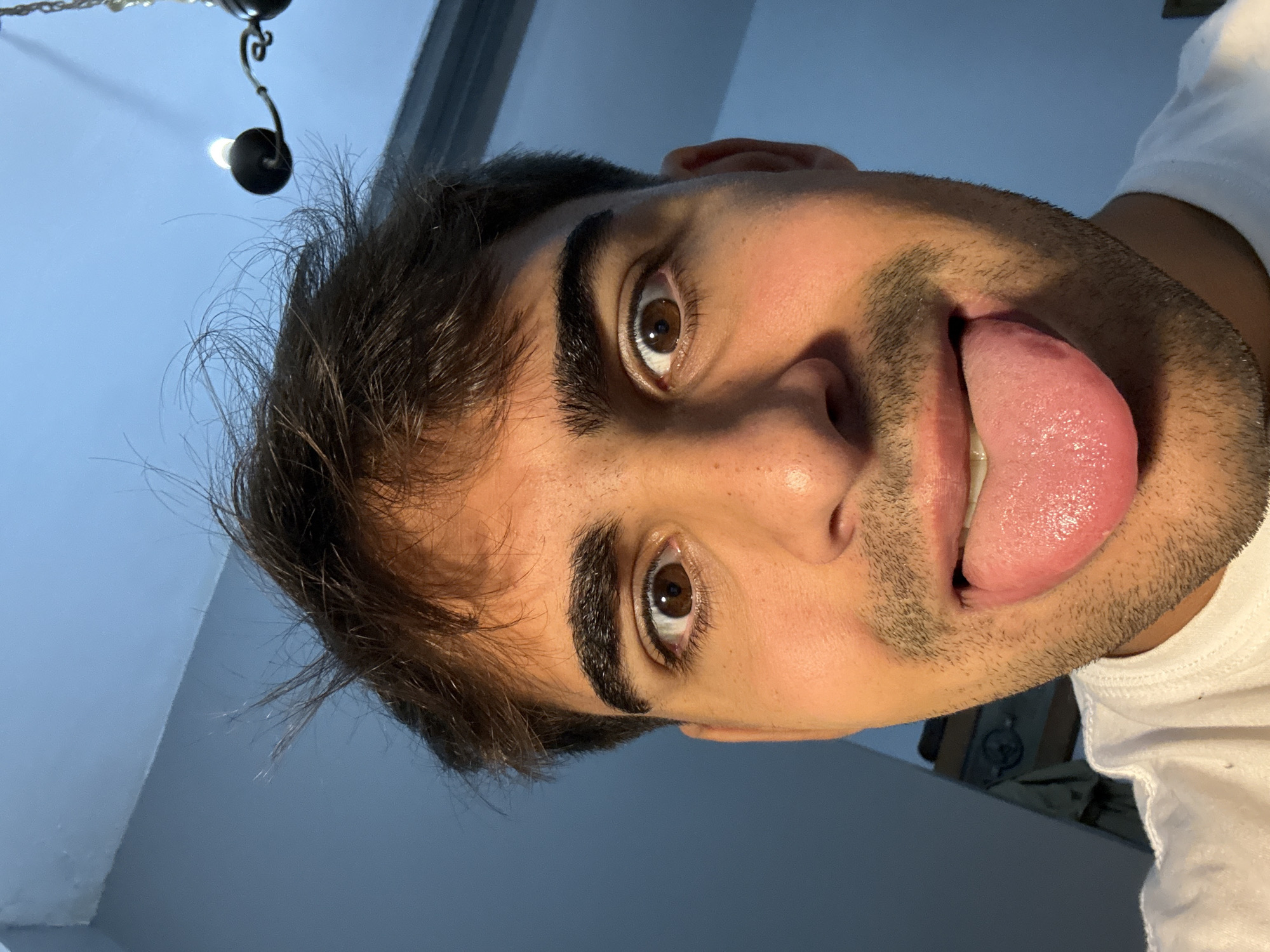 Young man takes selfies in Avellaneda, Argentina