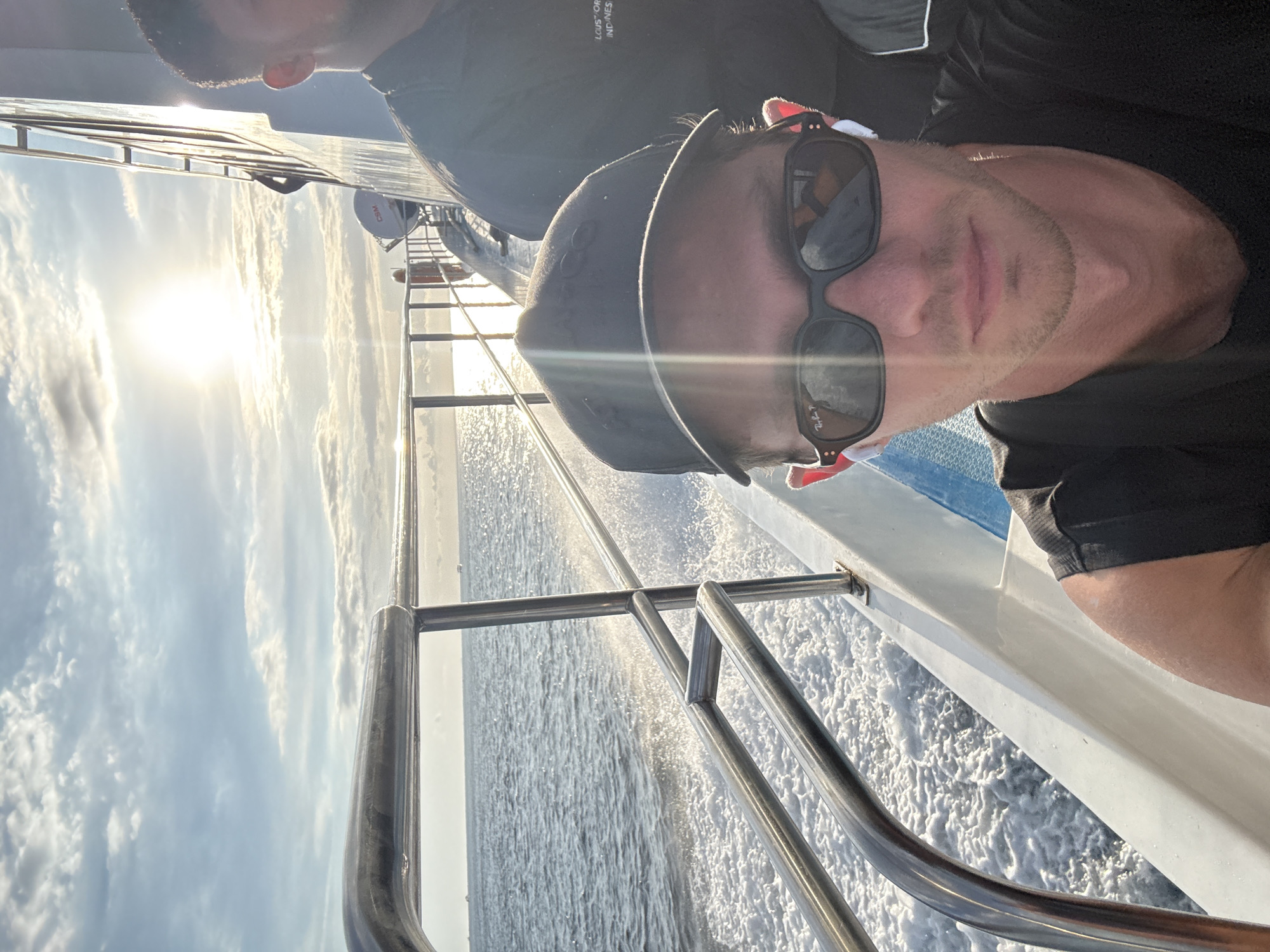 Man takes selfie on moving boat in Indonesian waters