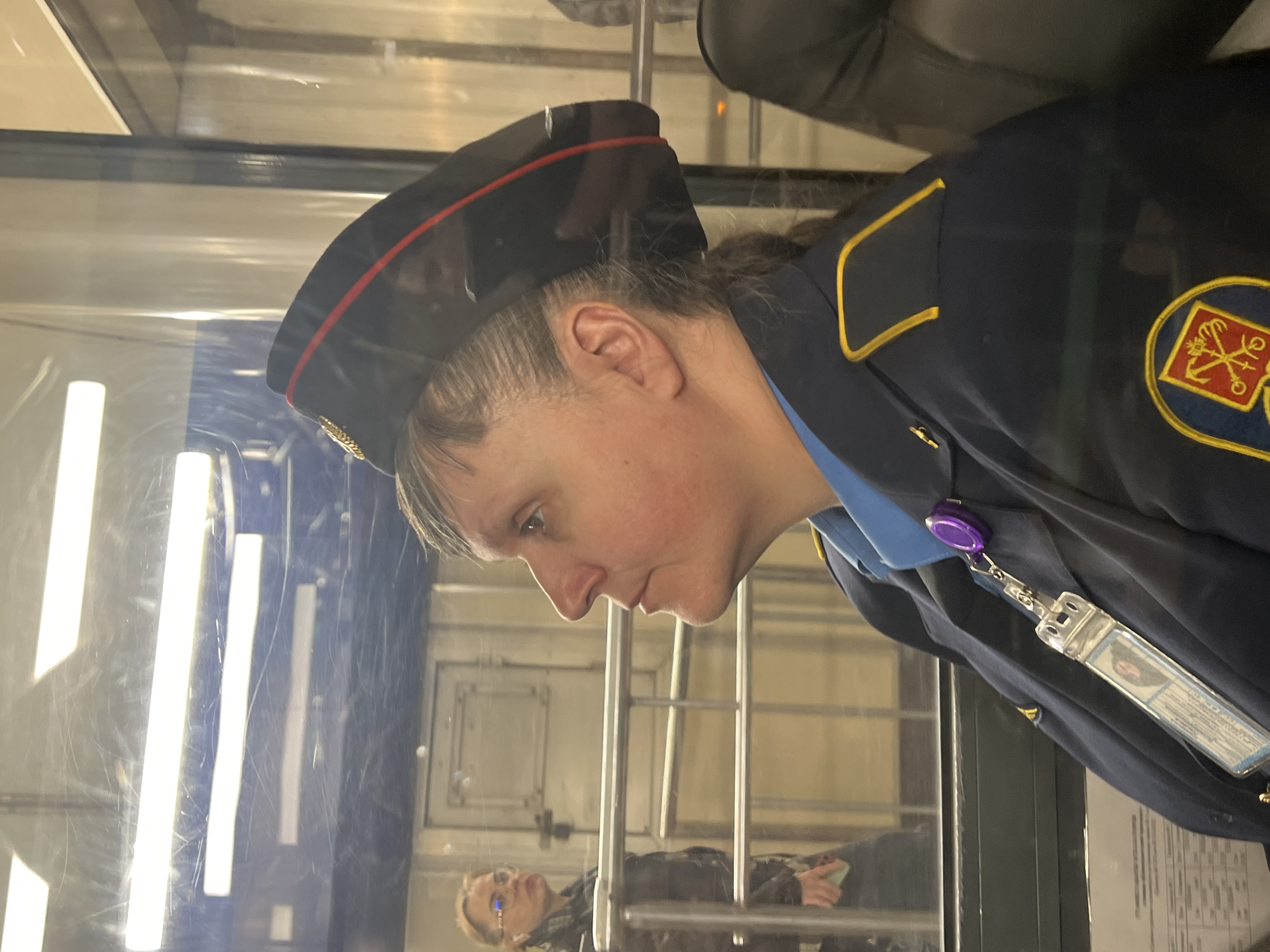 Evening commute and uniformed personnel observed in Shushary