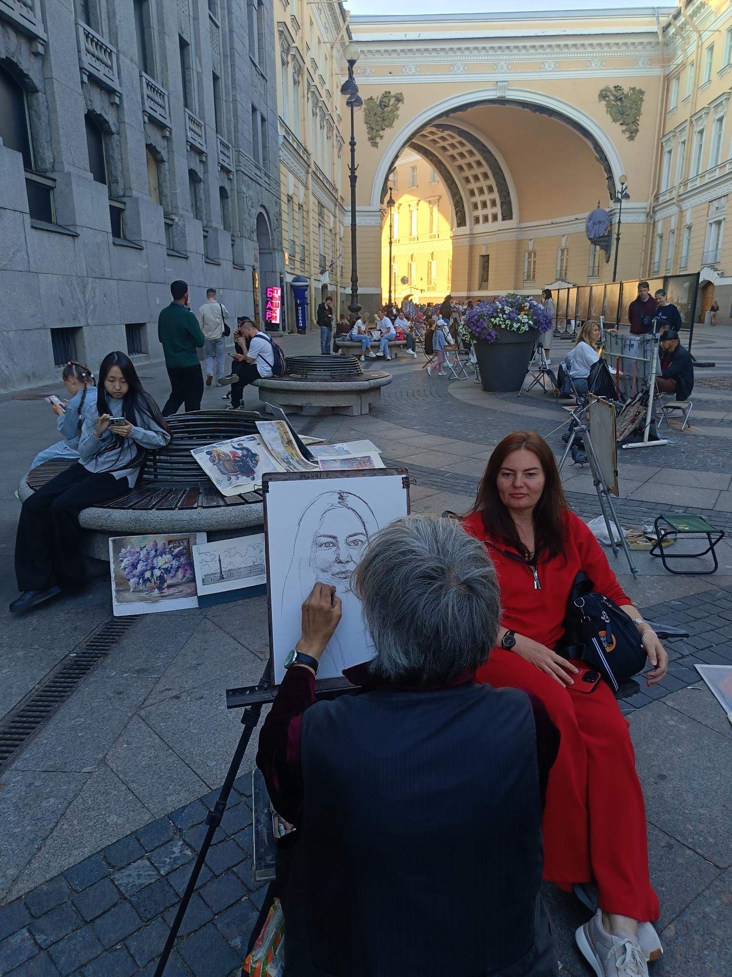 Street performers and caricature artists working central Saint Petersburg