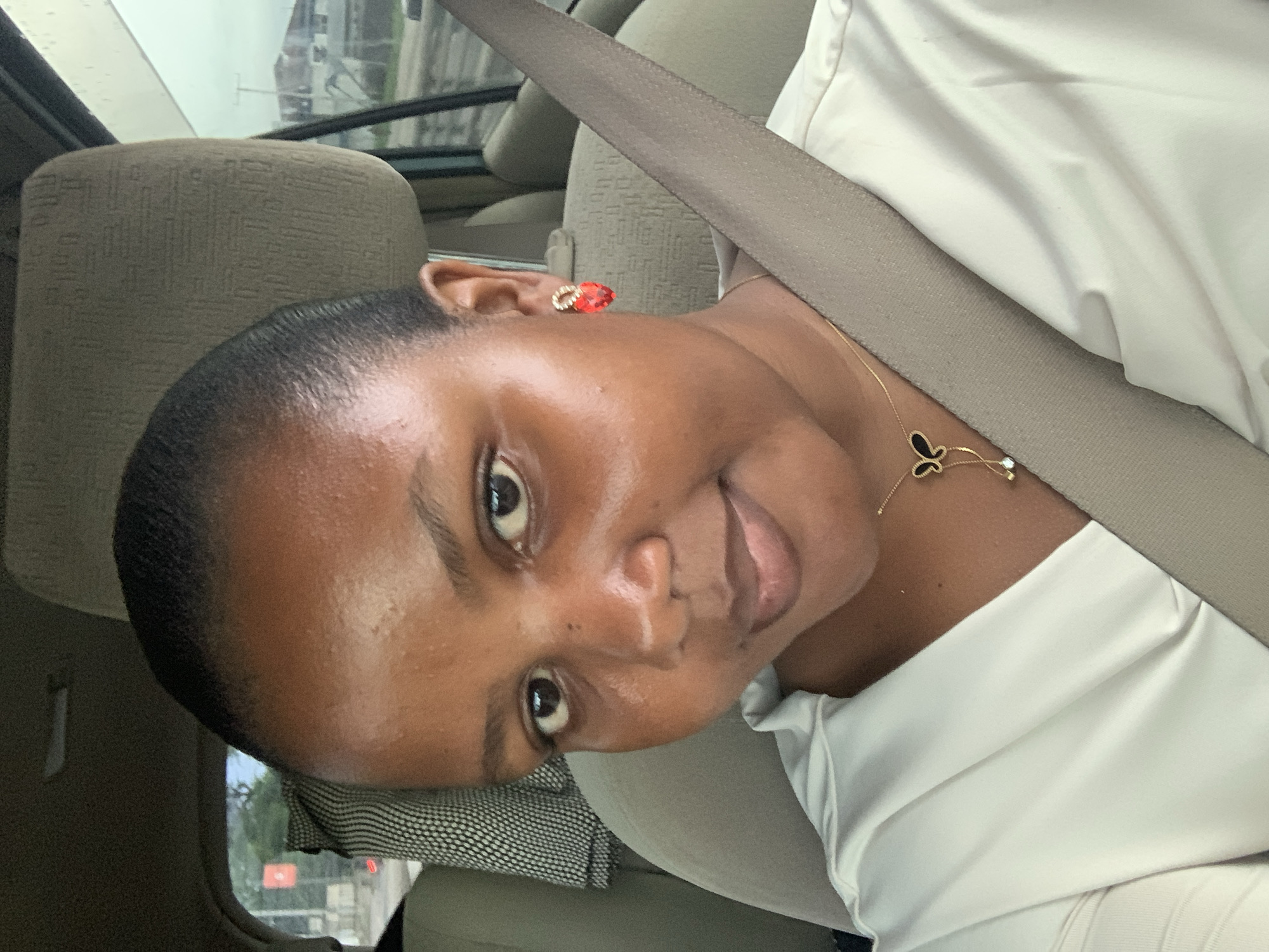 Woman passenger photographed in car in Dar es-Salaam