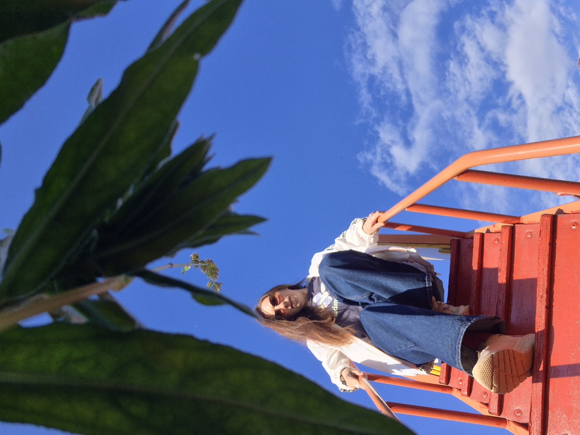 Young women enjoy afternoon playground visit in Chaikovsky, Russia