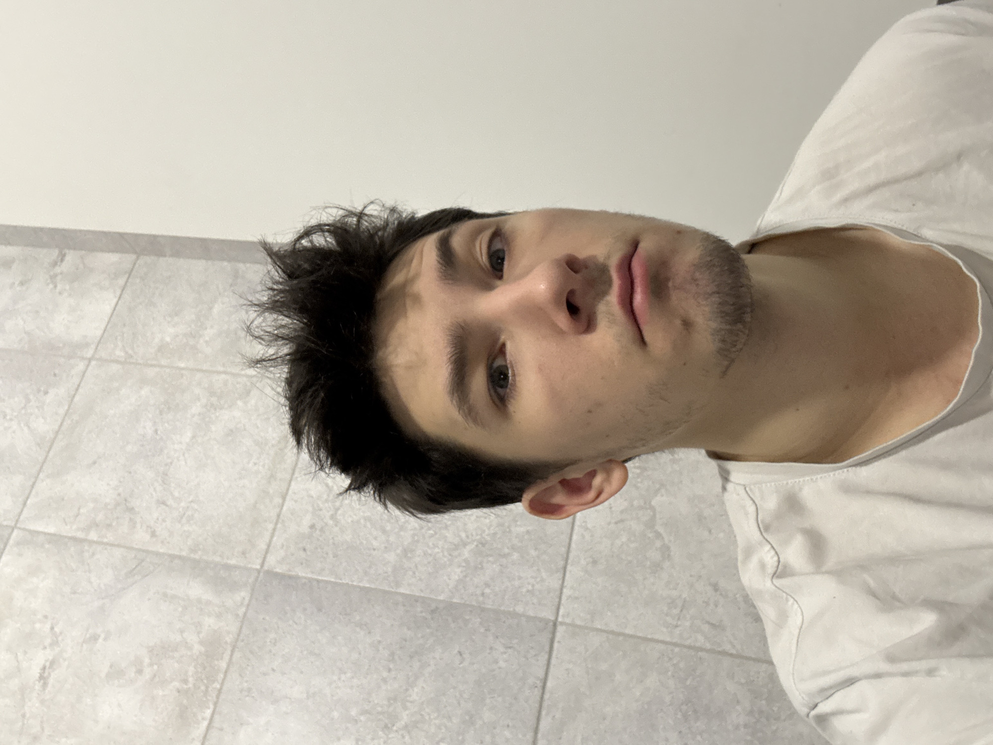 Young man photographed in indoor setting in Yanino-1