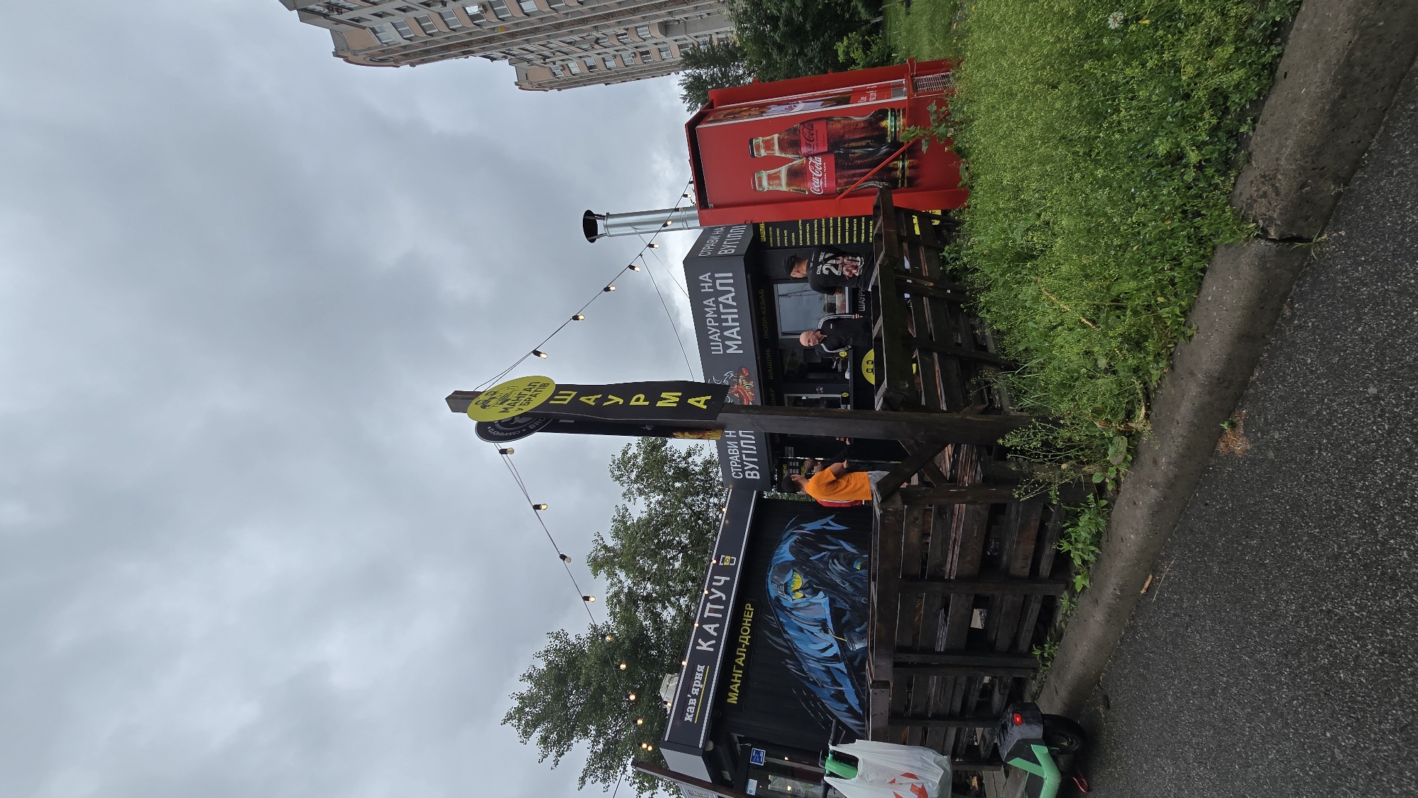 Outdoor food court captured in Kyiv under overcast skies
