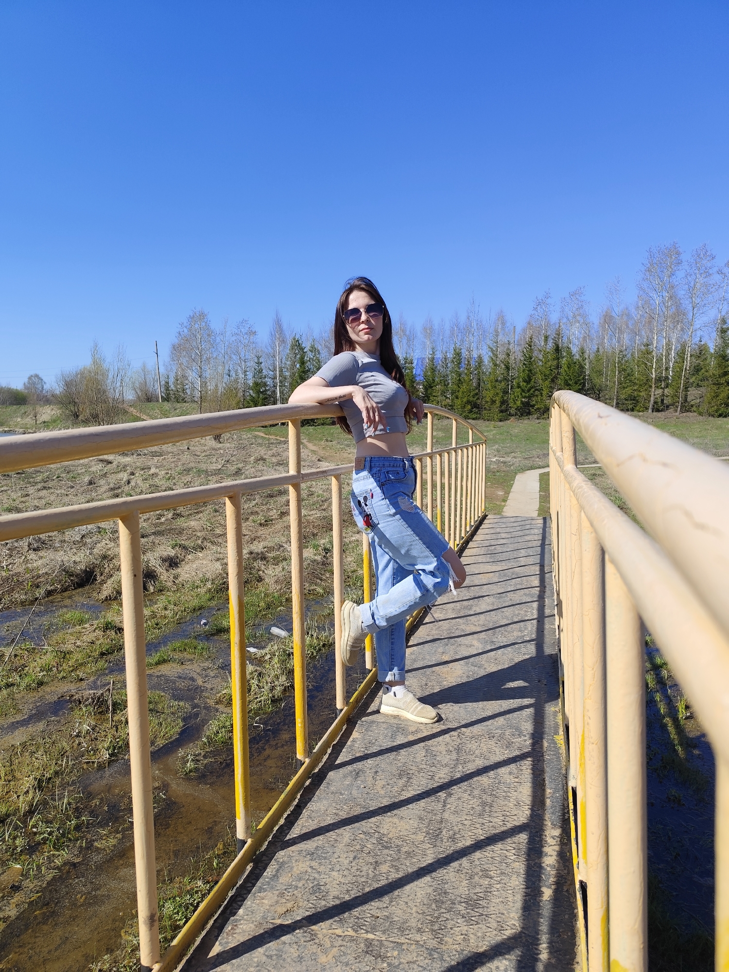Woman photographs casual outing around Фоки, Russia waterfront locations