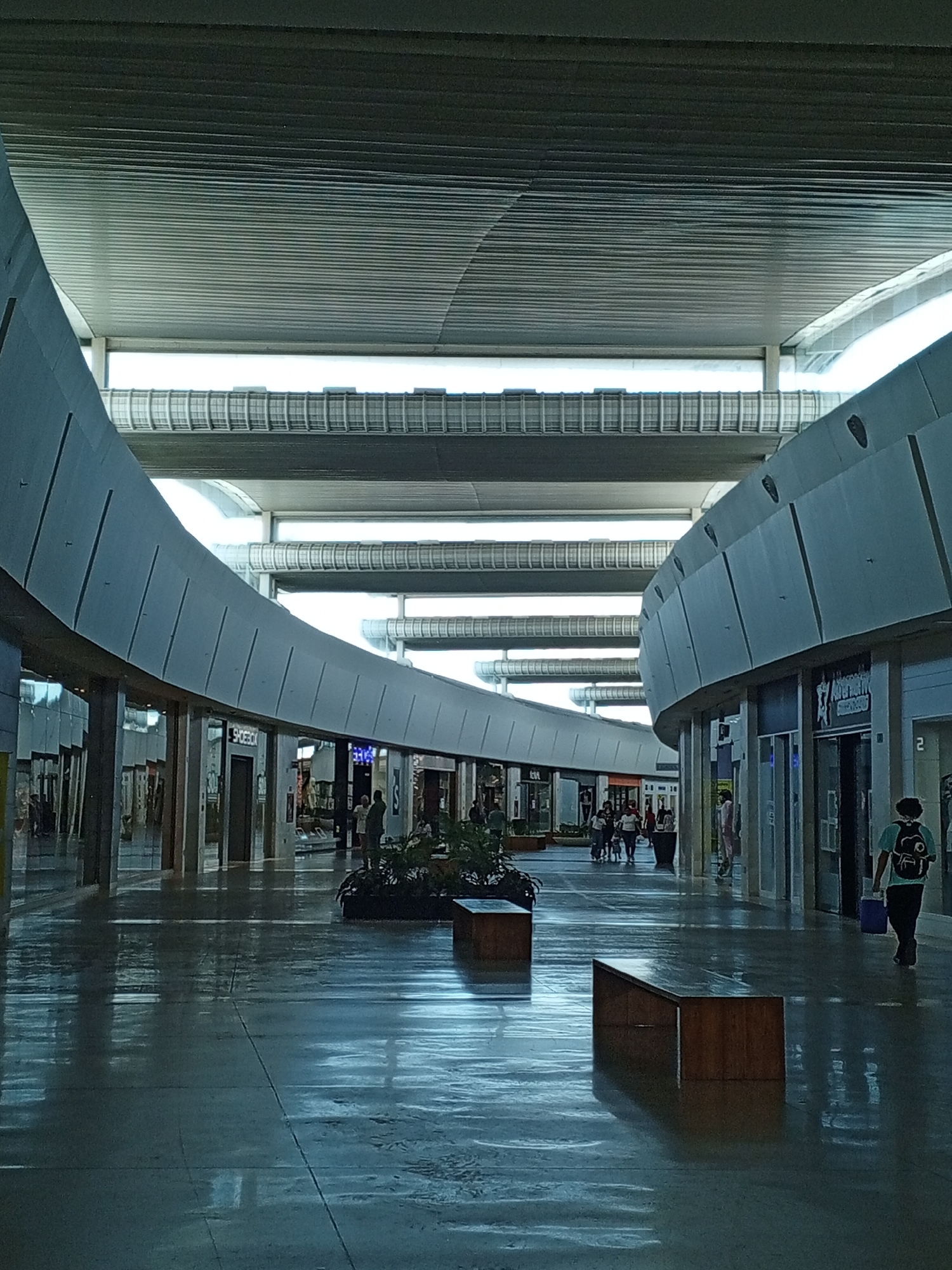 Evening documentation of modern shopping mall interior in Pampatar