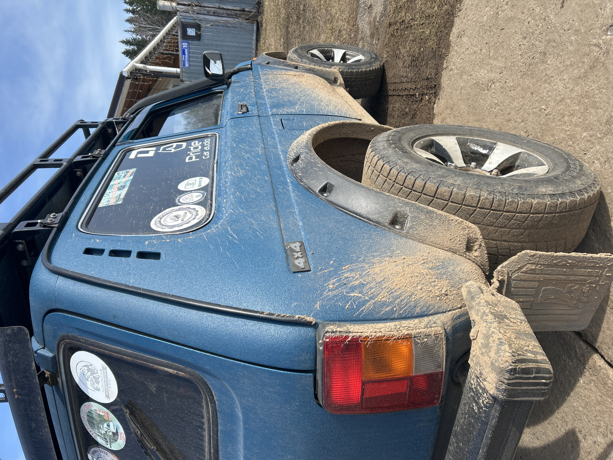Muddy off-road vehicle documented in Russian town spring morning