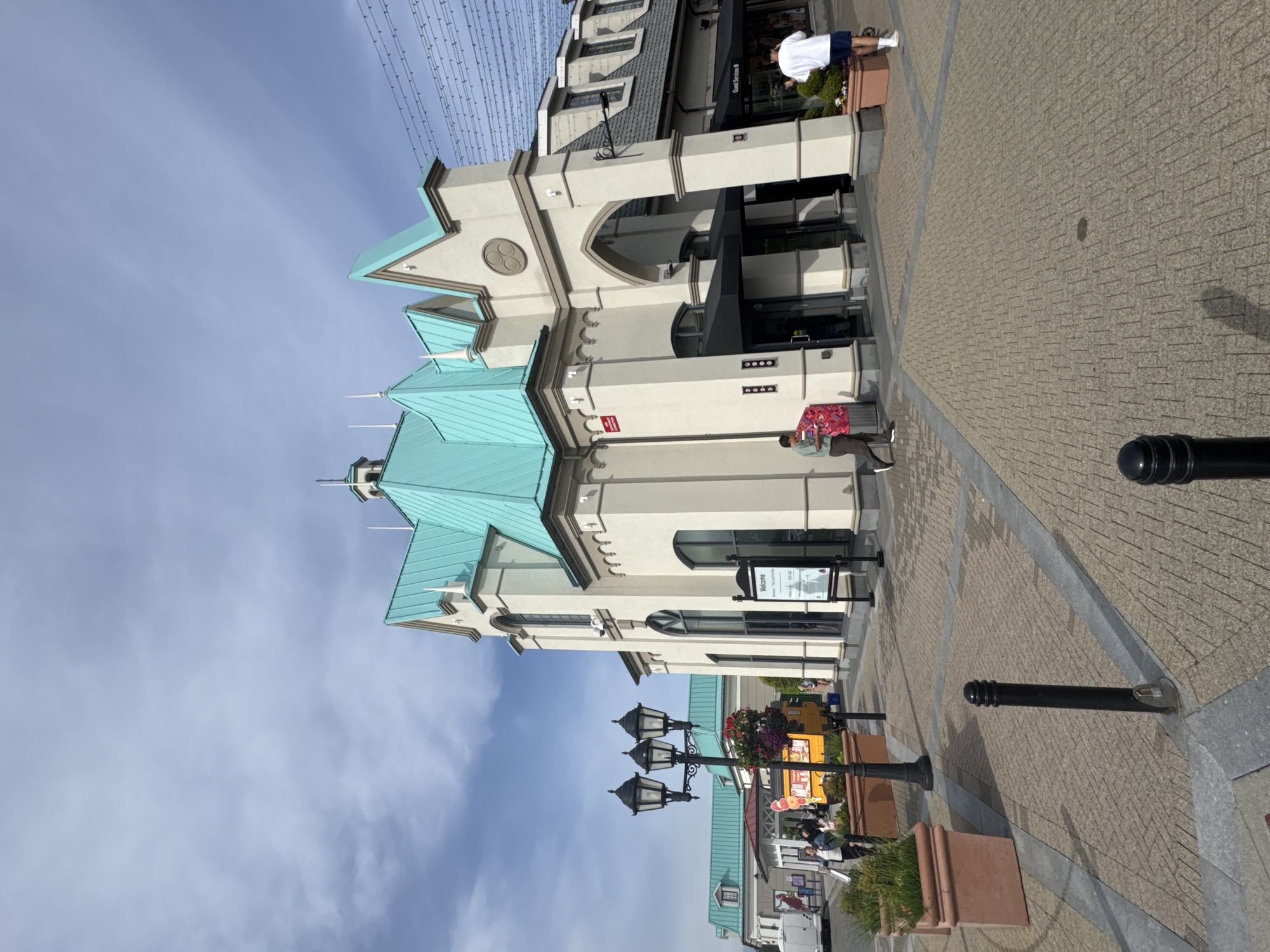Visitor documents stroll through Richmond designer outlet mall