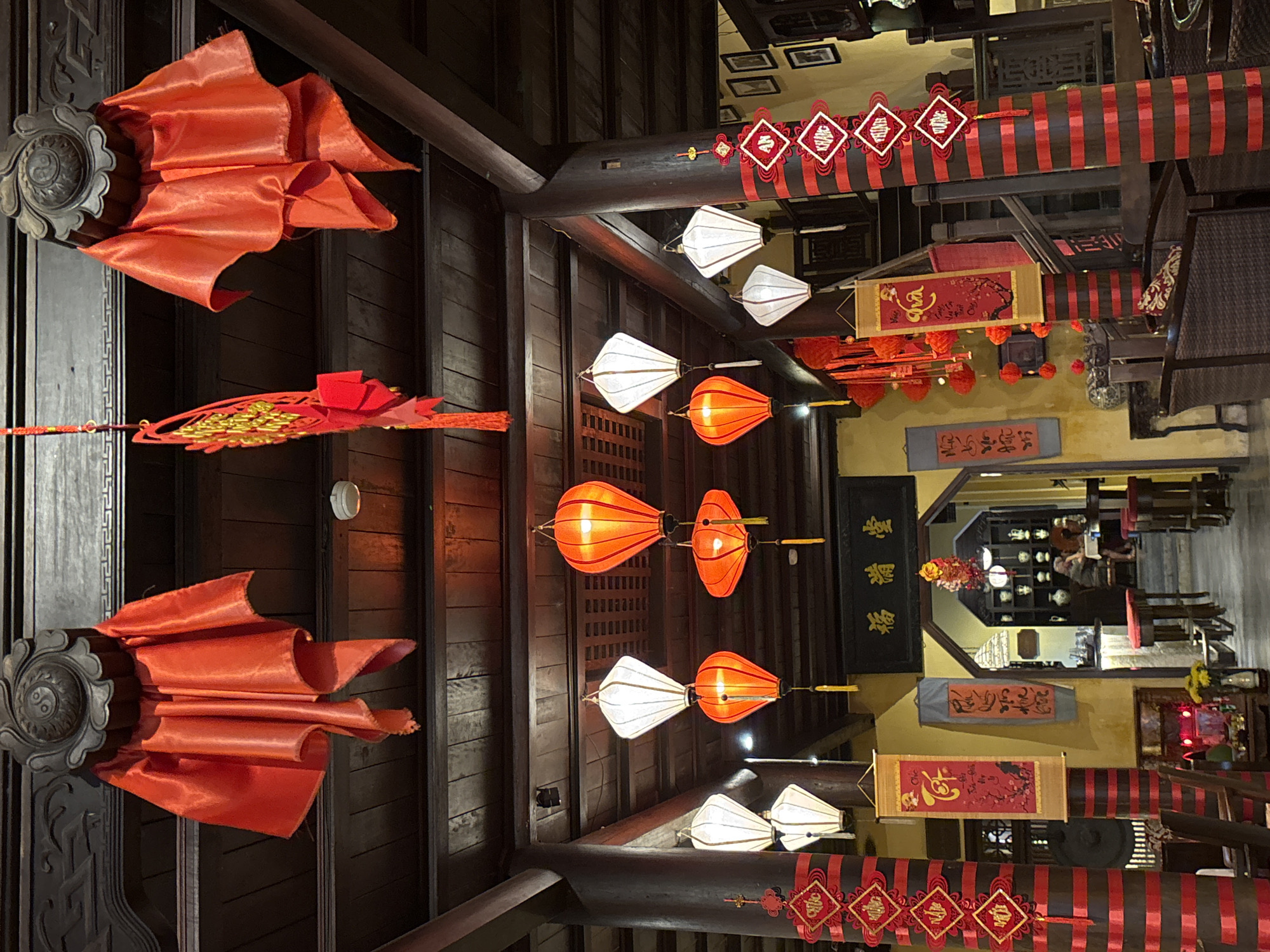 Traditional lanterns and eyeglass display captured in Hội An