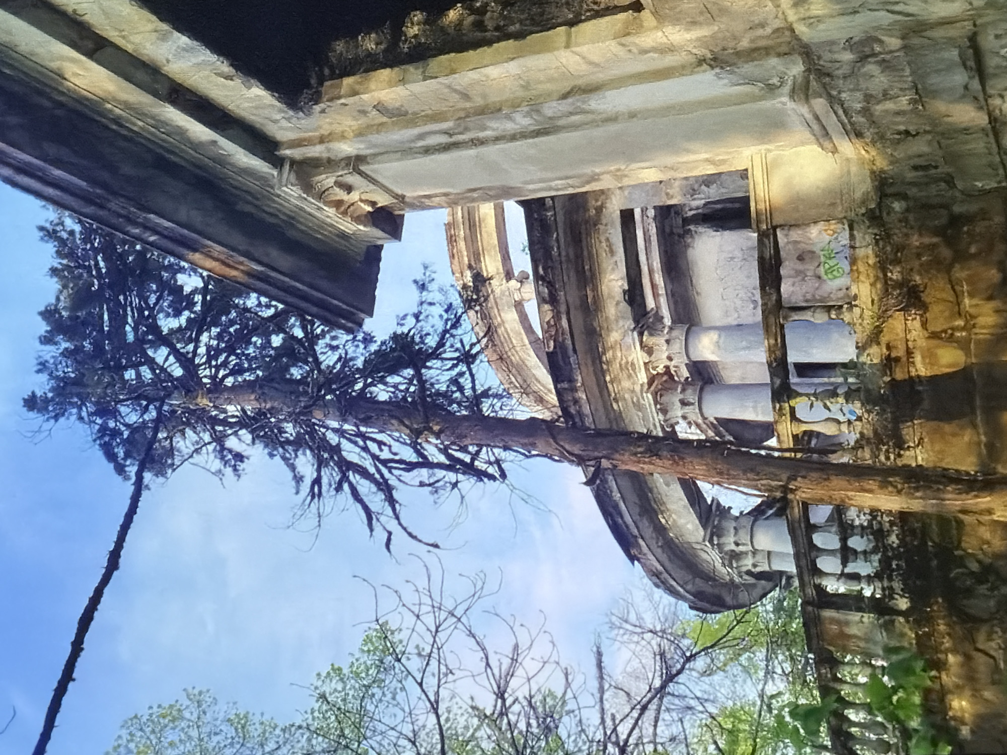 Witness documents abandoned architecture and stone archway structures