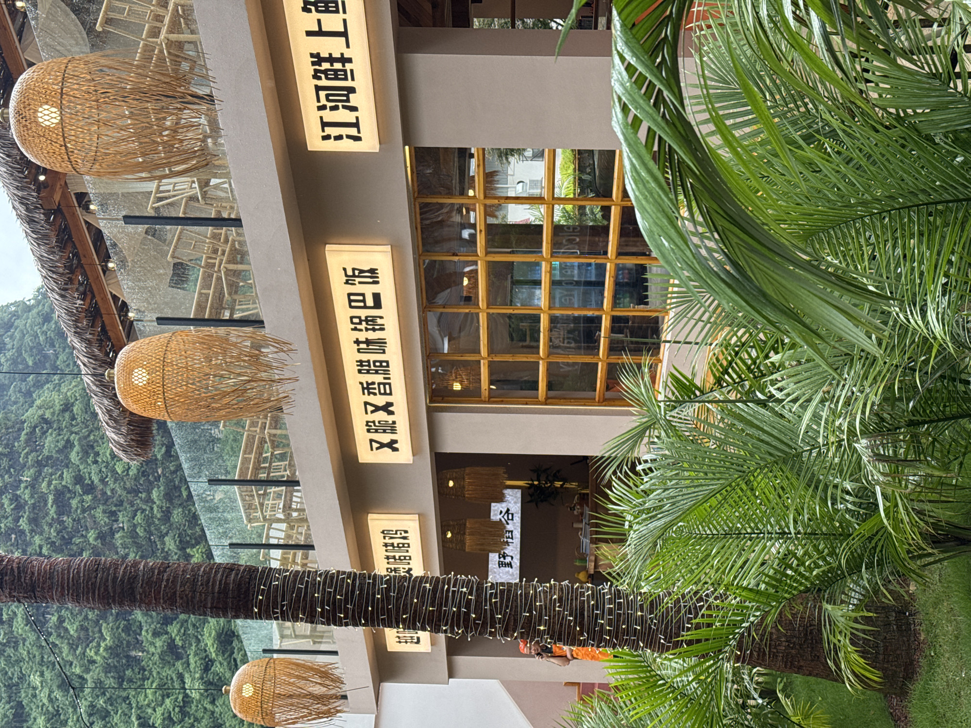 Tourist documents tropical resort complex in Guilin, China