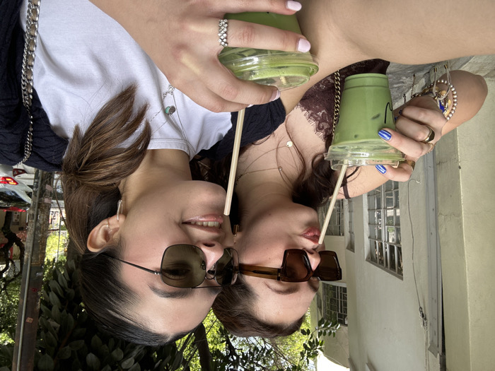 Young women enjoy matcha drinks in Mexico City's Roma