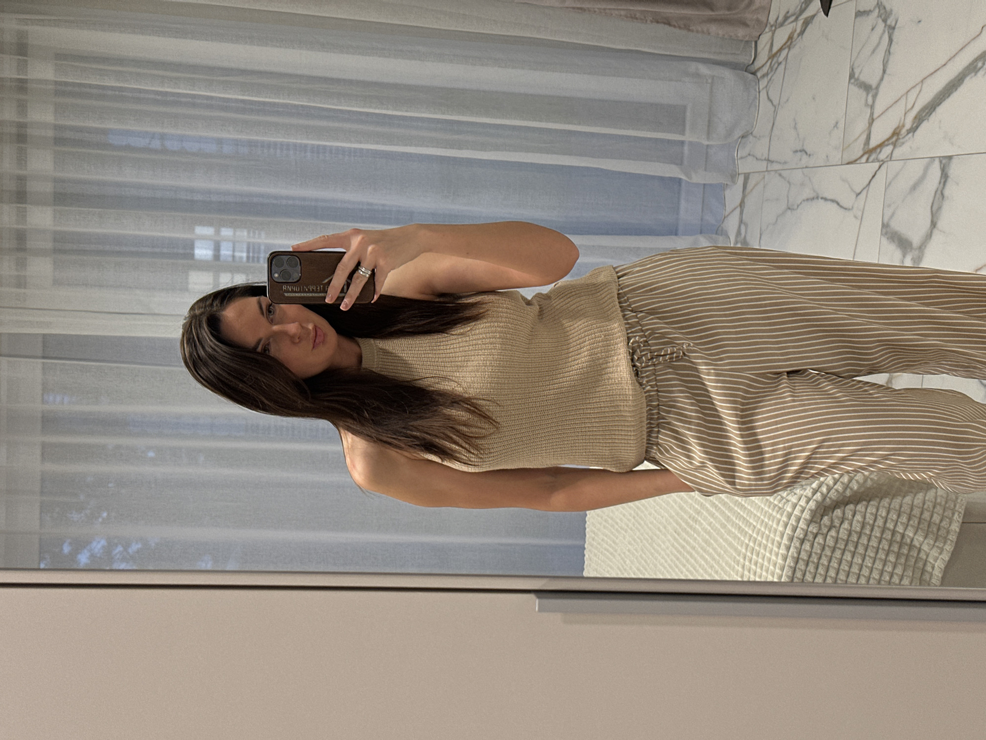 Woman takes indoor selfies in Chaikovsky, Russia