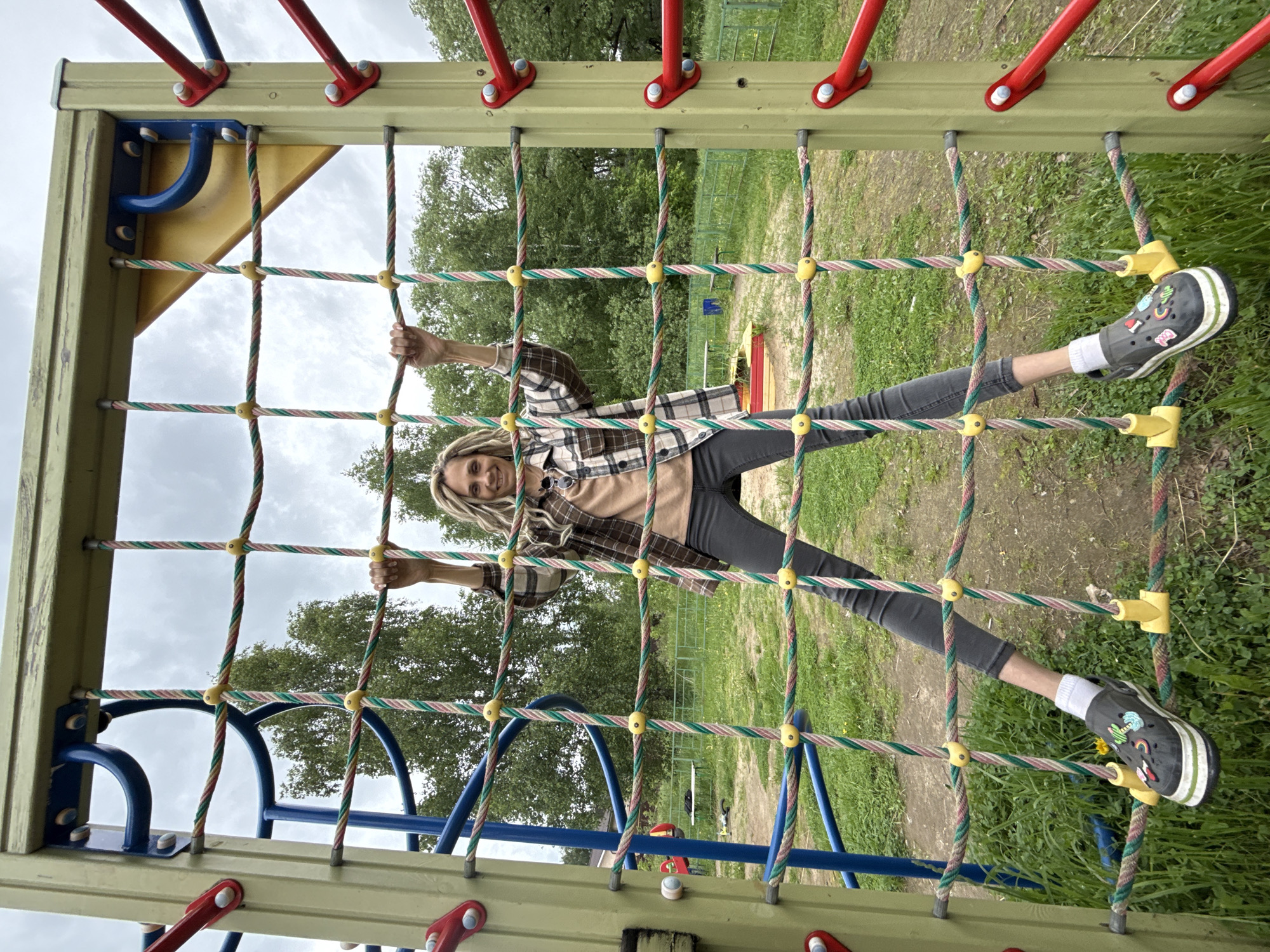 Family playground time captured in Rusanovo park setting