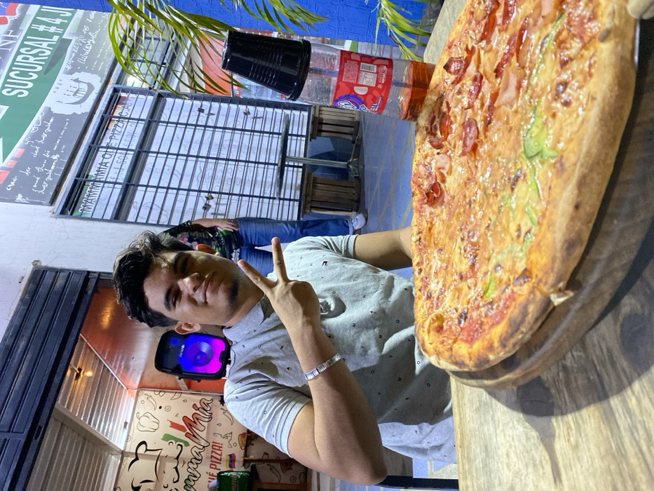 Friends enjoy dinner and beach evening in Juan Griego