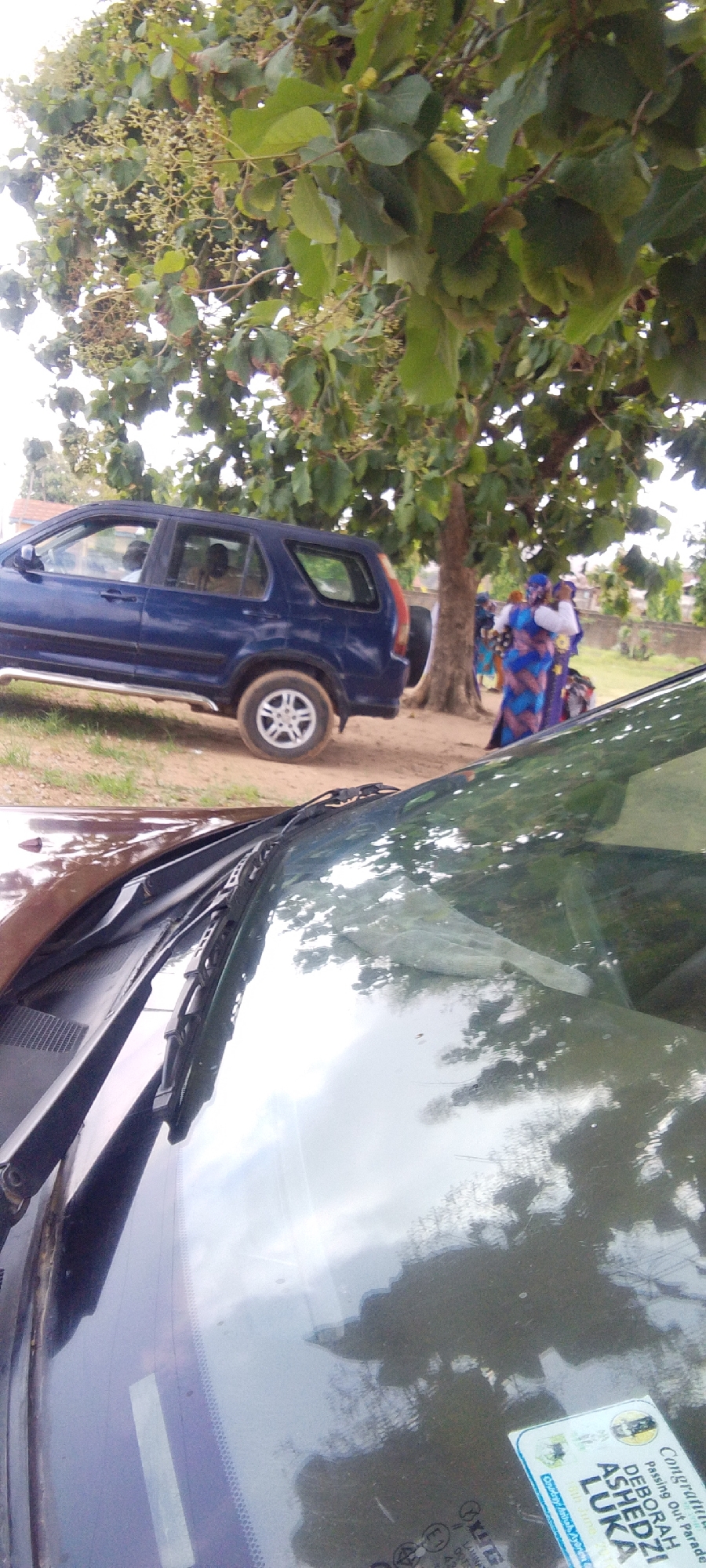 Everyday scenes across two neighboring Nigerian towns, late morning