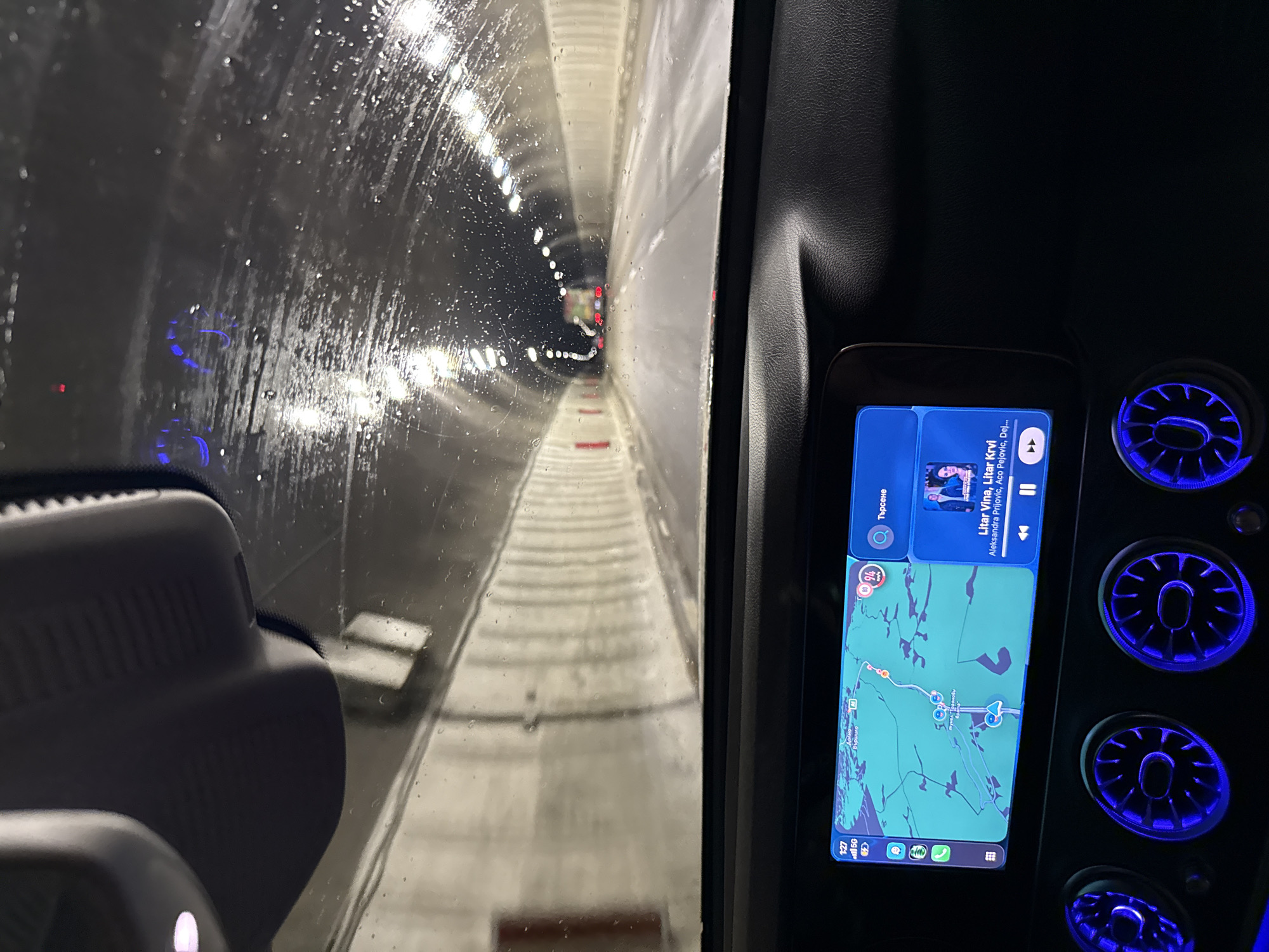 Vehicle passes through illuminated tunnel in Dolna Vasilitsa, Bulgaria