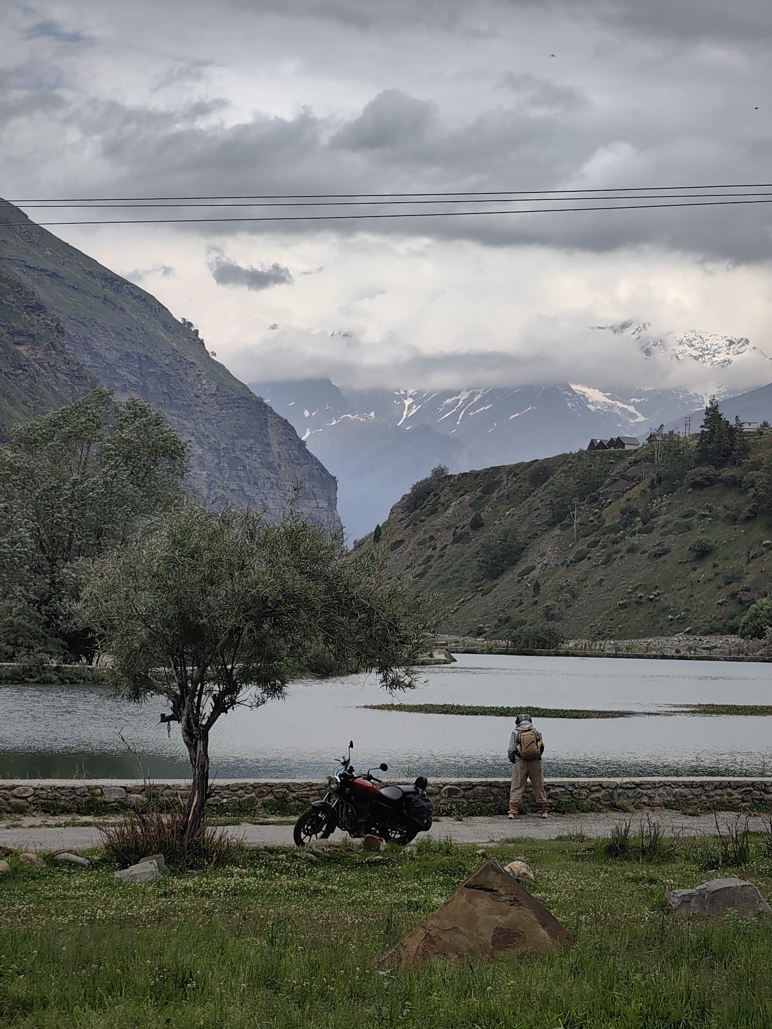 Lake, waterfall, and mountain roads at Yamling