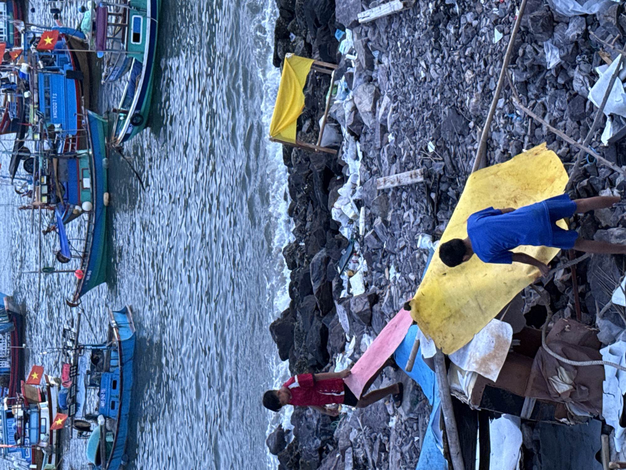 Nha Trang's fishing harbor and shoreline on a July morning