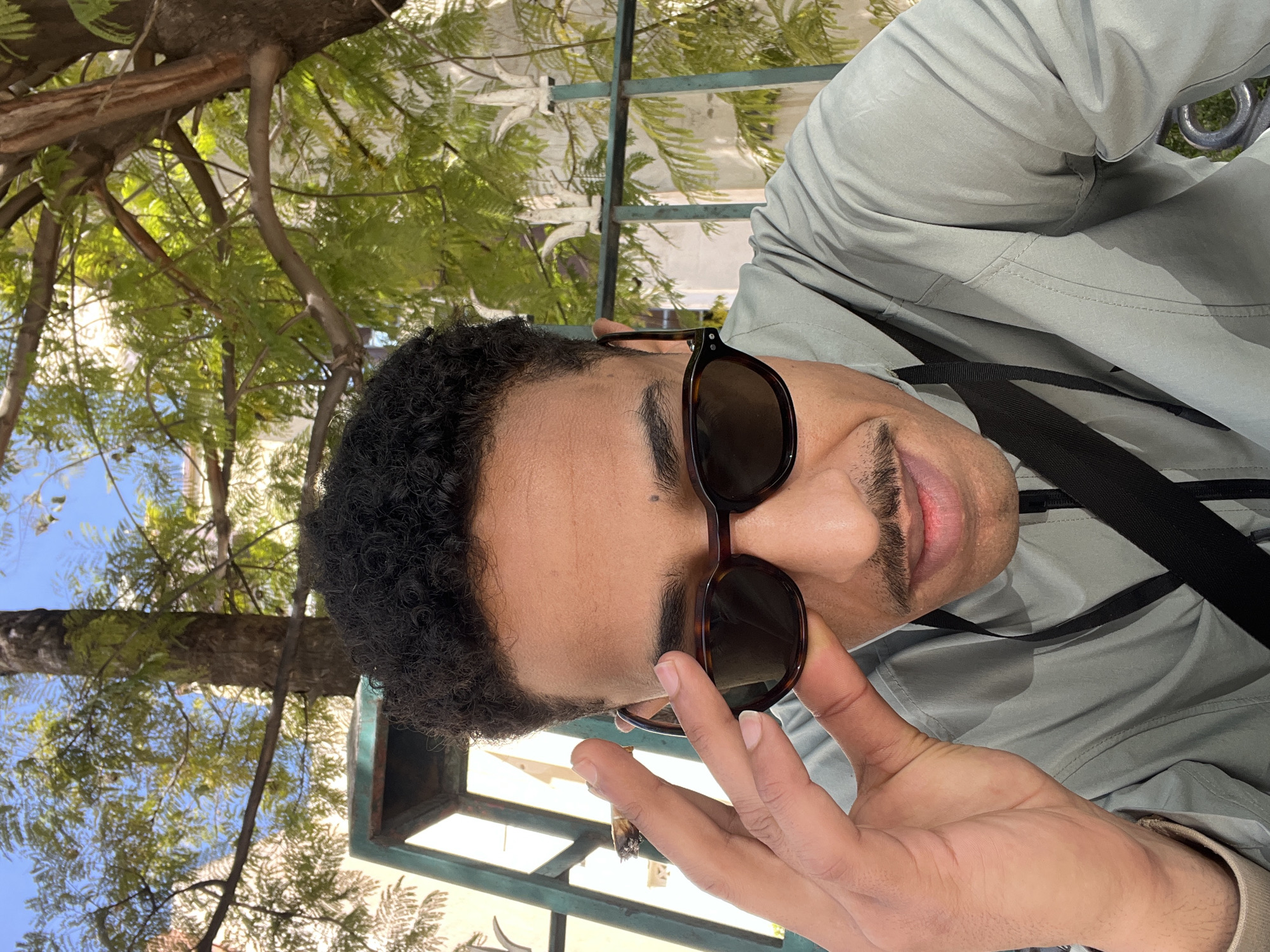 Tourist documents day exploring Meknes, Morocco with multiple selfies