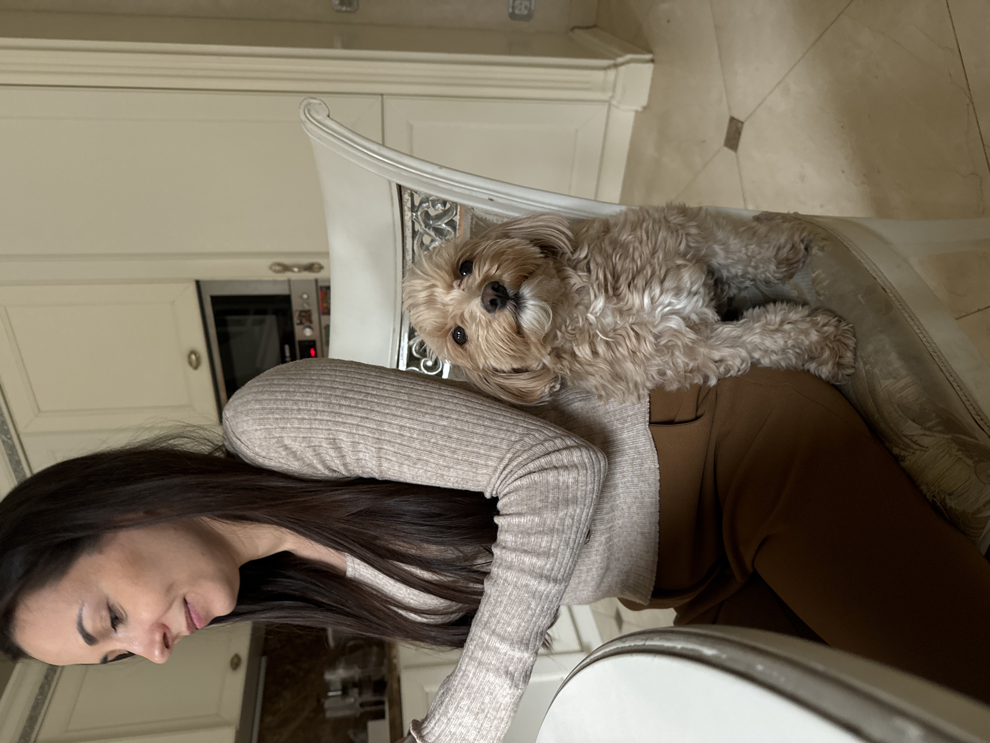 Woman enjoys quiet morning with dog in Krasnoyarsk