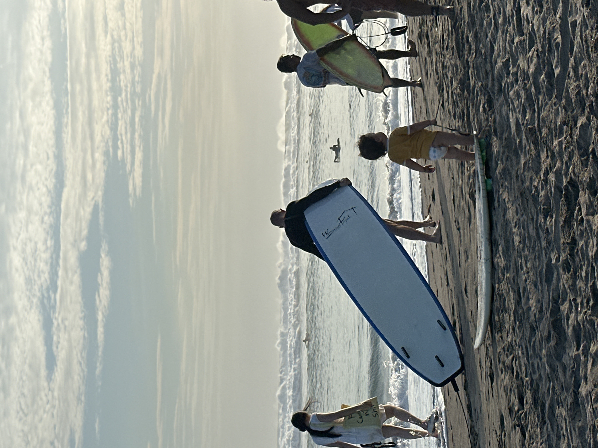 Morning beach life unfolds in North Kuta, Indonesia