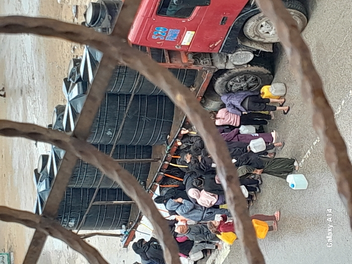 Water distribution documented at Khan Yunis displacement camp