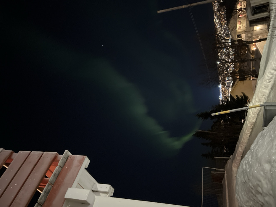 Aurora borealis illuminates Tromsø sky in winter display