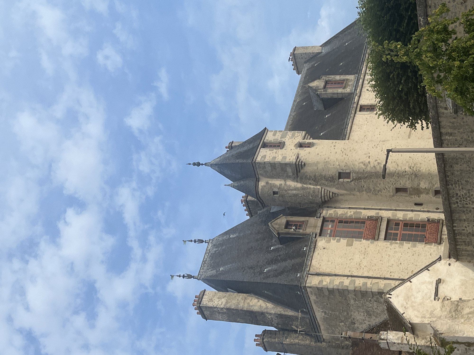 Old stone church exterior, domed tower and ornate details