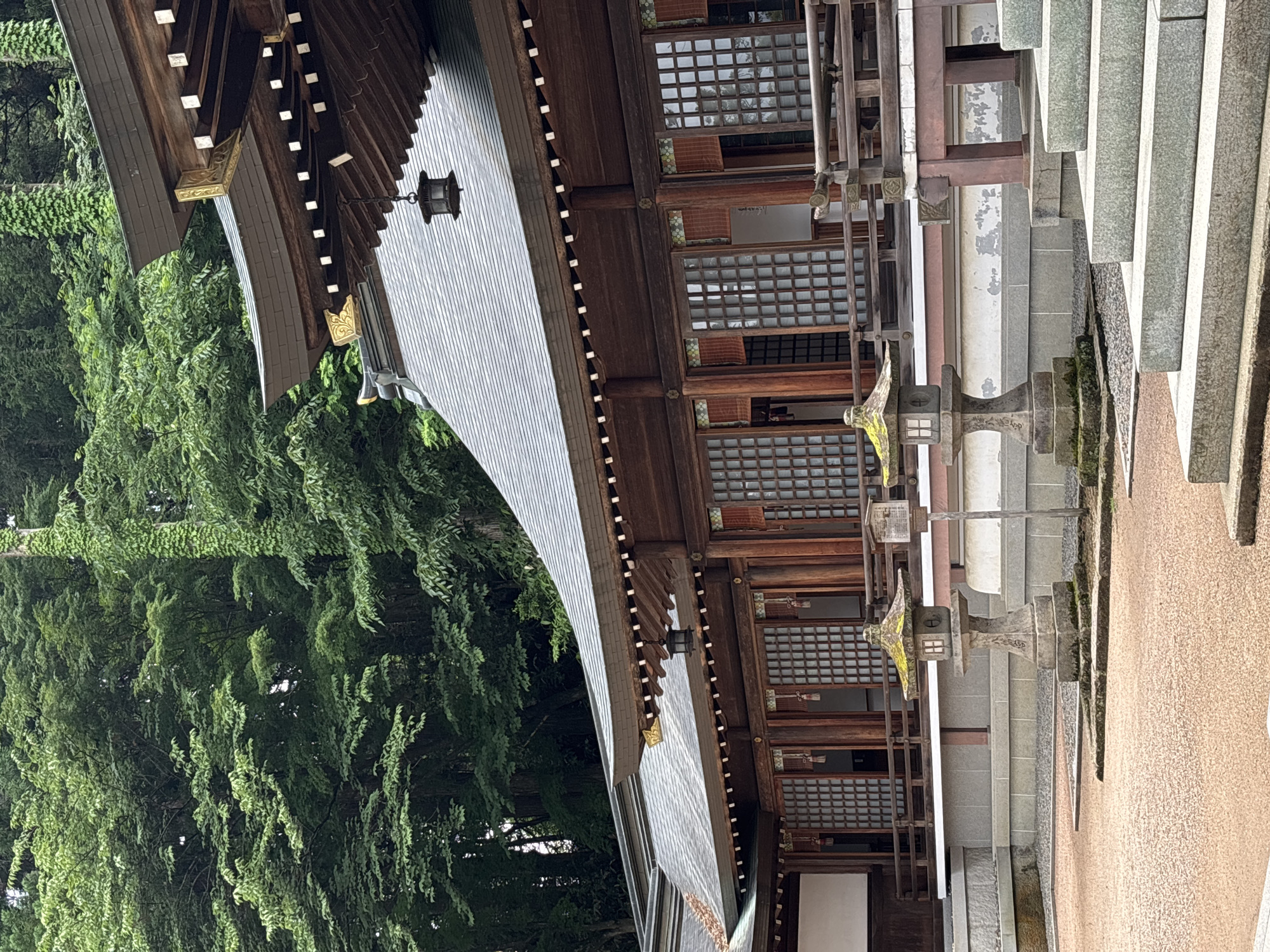 Tourist documents pre-dawn temple visit in Takayama, Japan