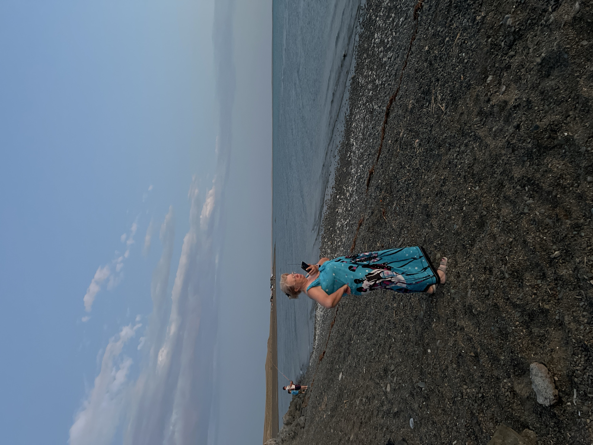 Sunset fishing on a rocky Caspian shore near Karashygan
