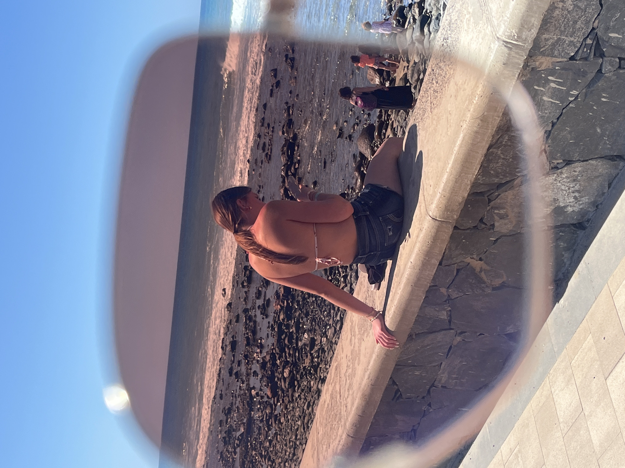 Tourists observe coastline from viewpoints in Maspalomas, Spain