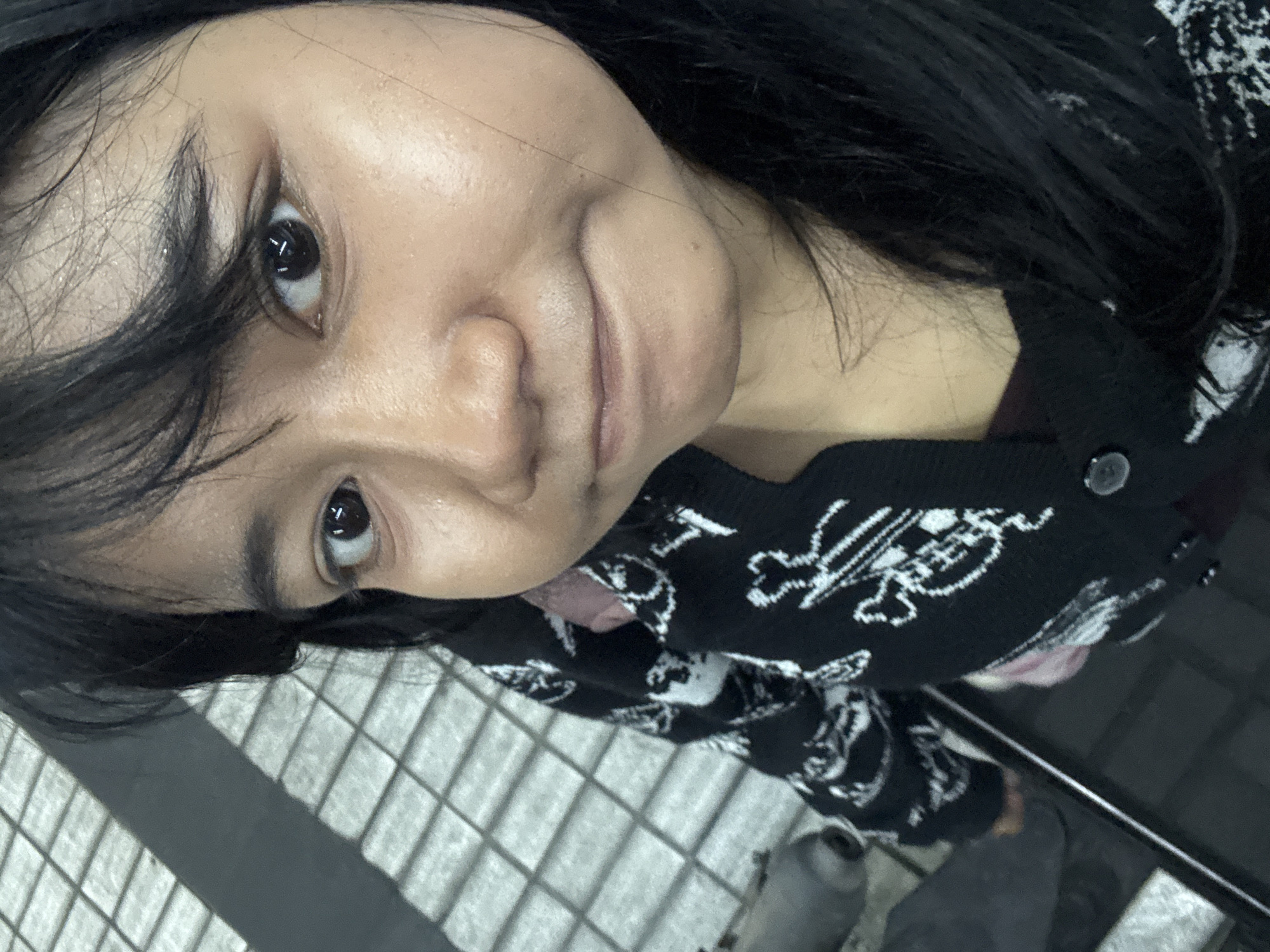 Inside a busy North Jakarta motorcycle shop, day into night
