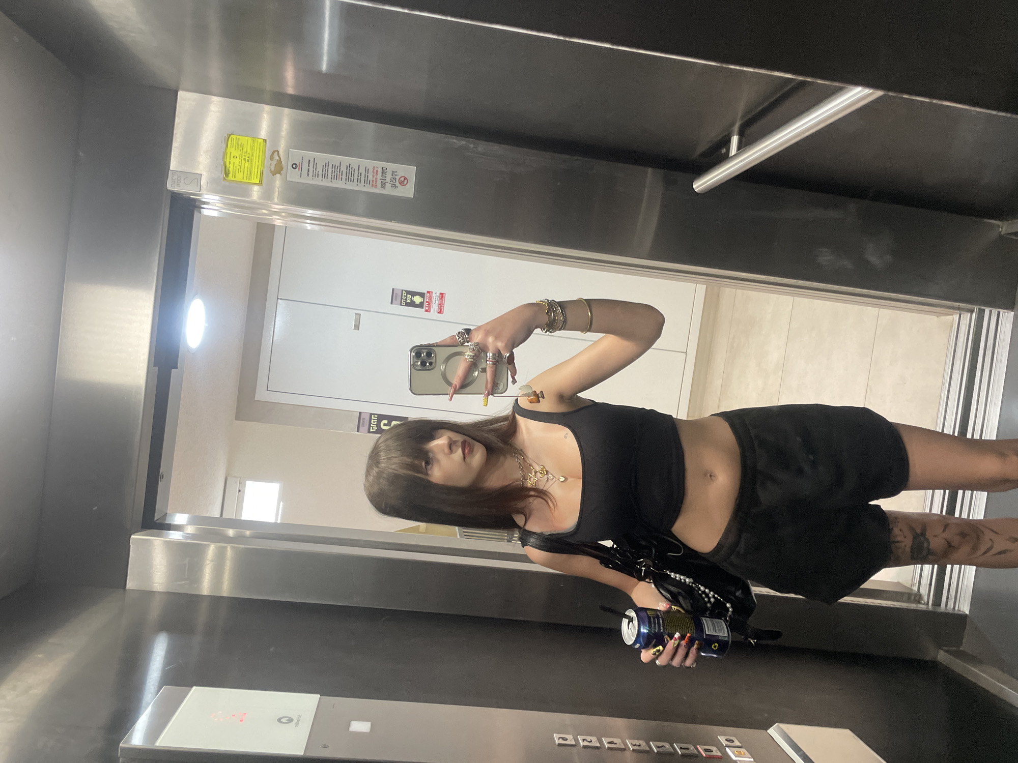 Woman takes elevator selfies while grocery shopping in Raanana