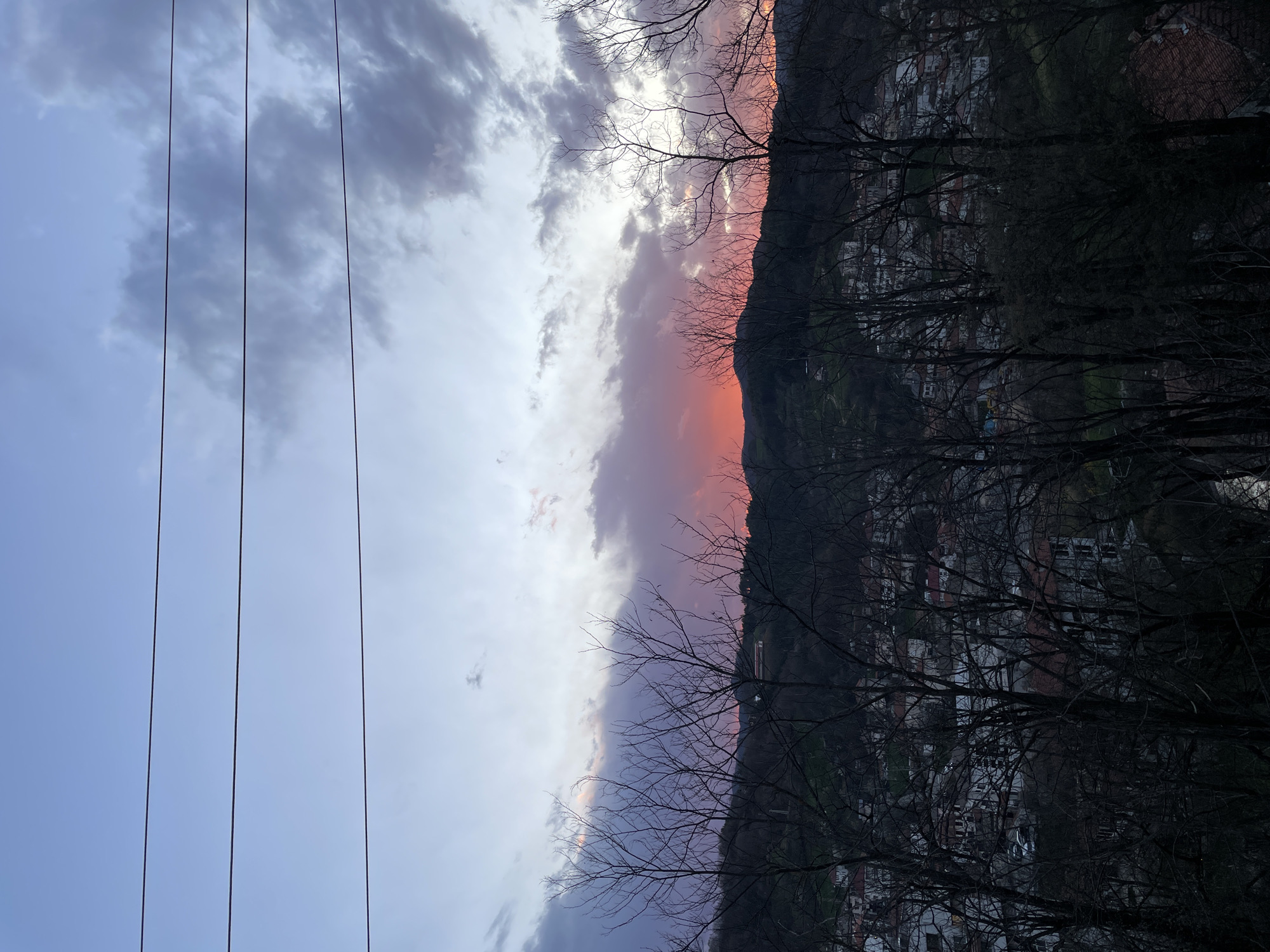 Sunset colors paint evening sky over Zlatograd, Bulgaria