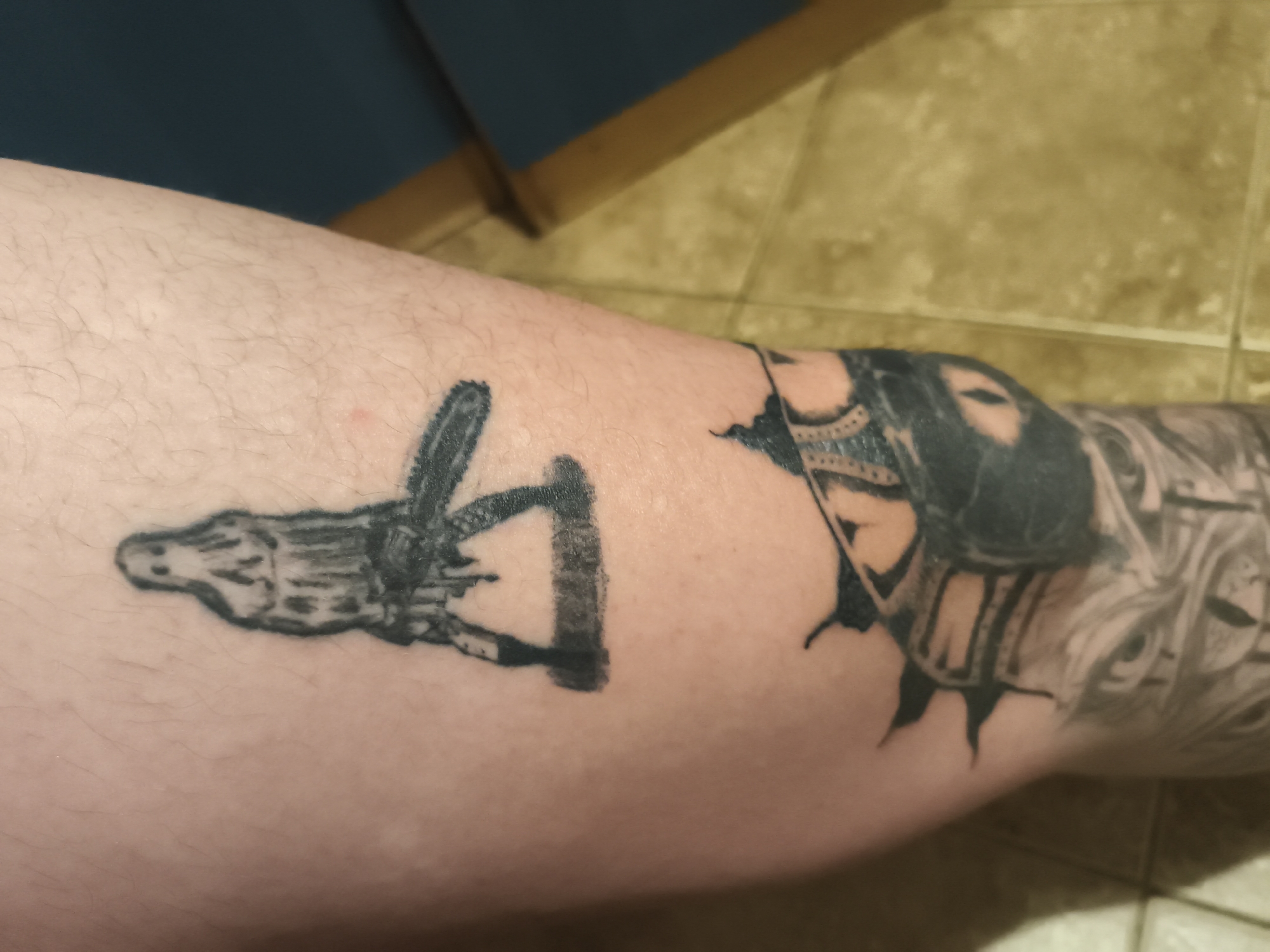 Tattooed individual documented in nighttime Nowy Tomyśl photography session