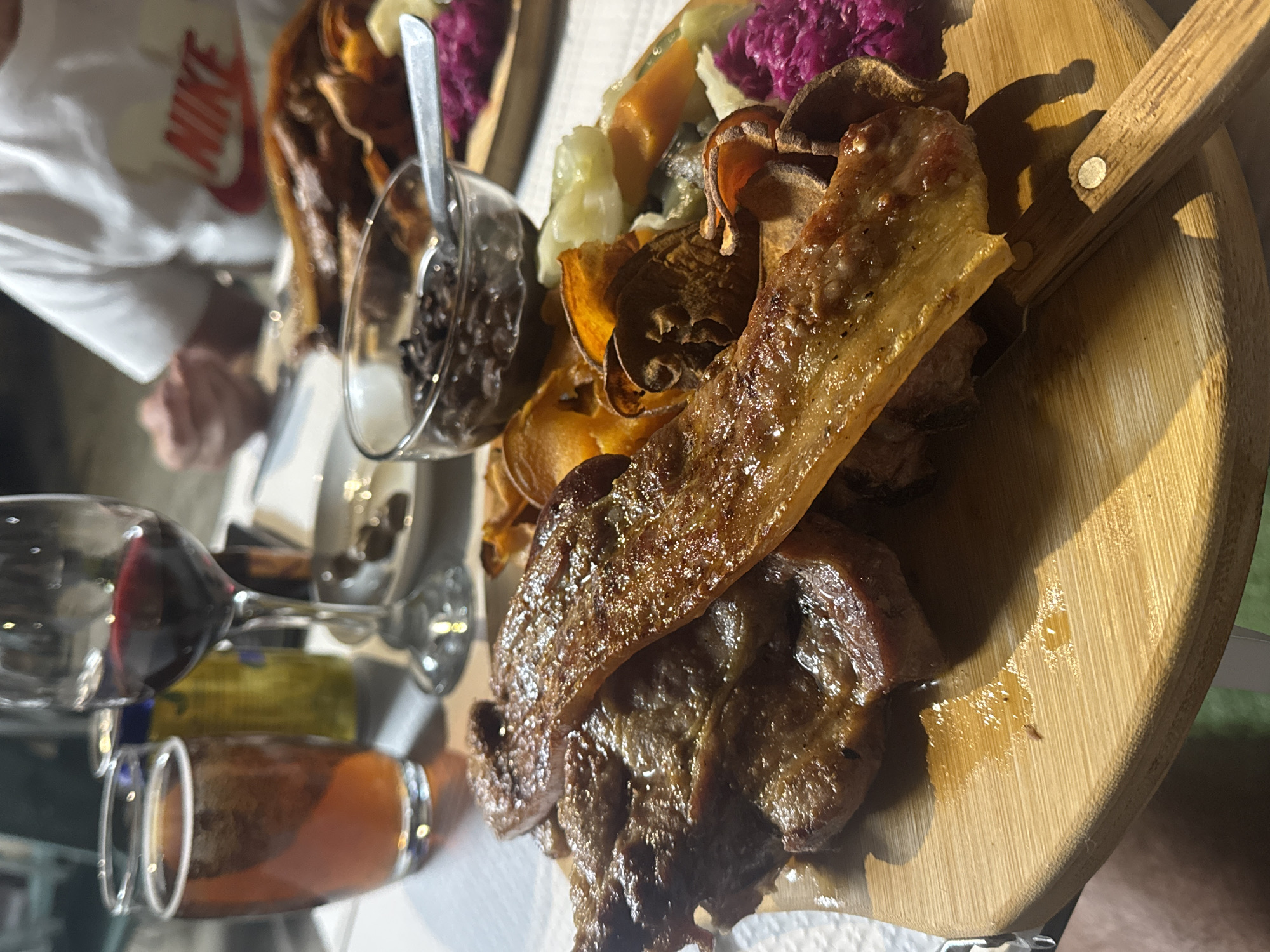 Cooked meat platter with accompaniments documented by witness
