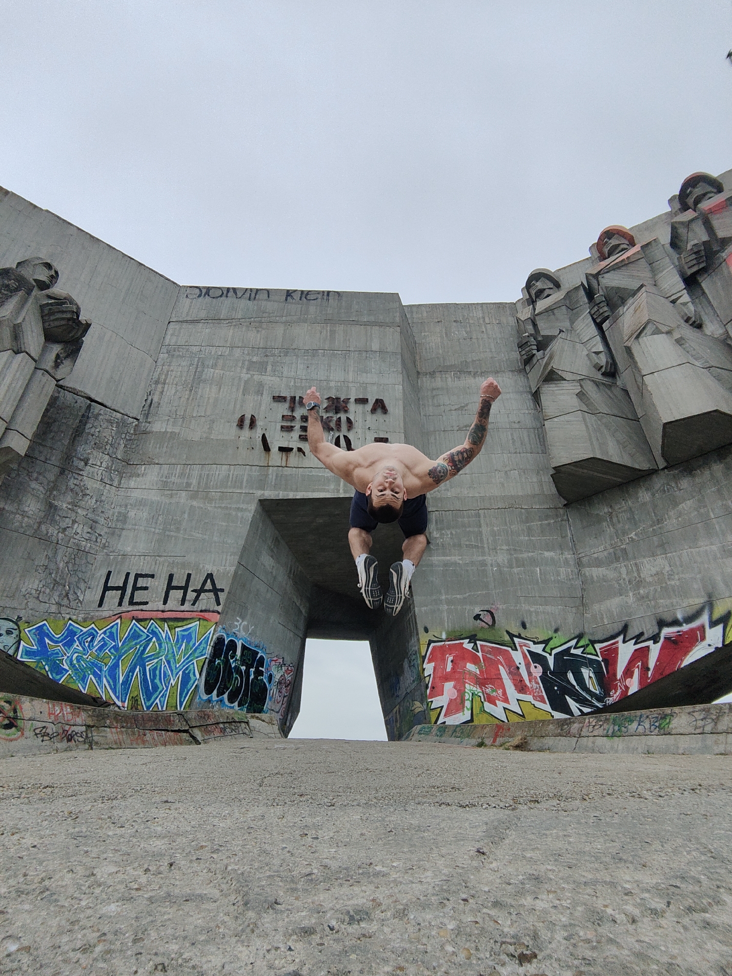 Man performs backflips at Soviet friendship monument in Varna
