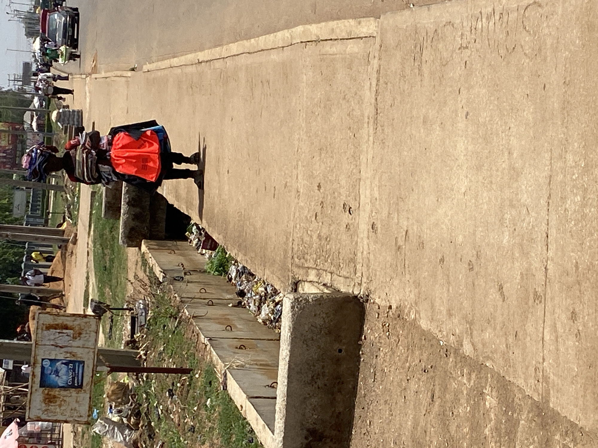 Daily market commerce bustles in Bukuru, Nigeria streets