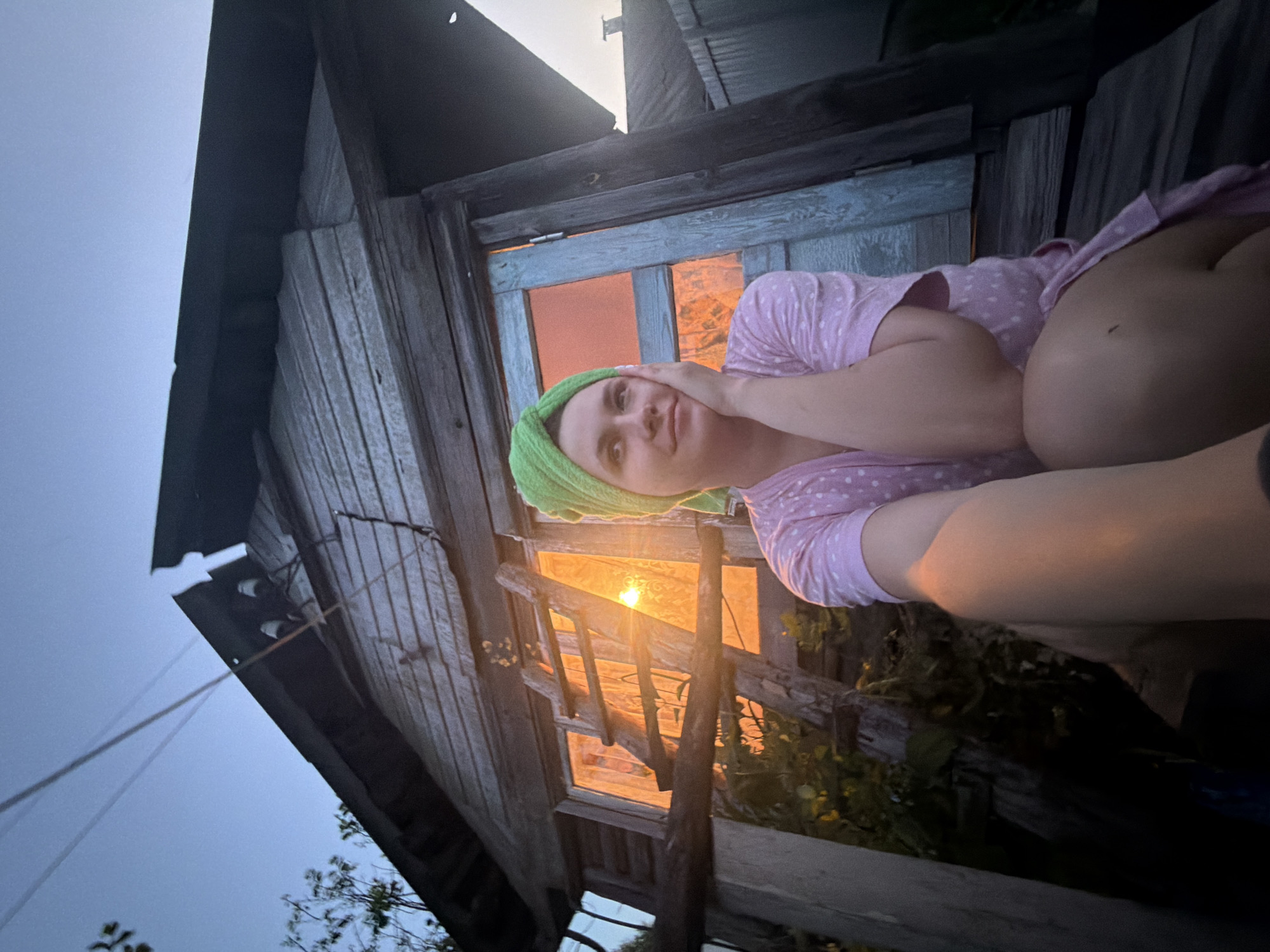 Evening porch scene in Krasny Mayak village, Russia